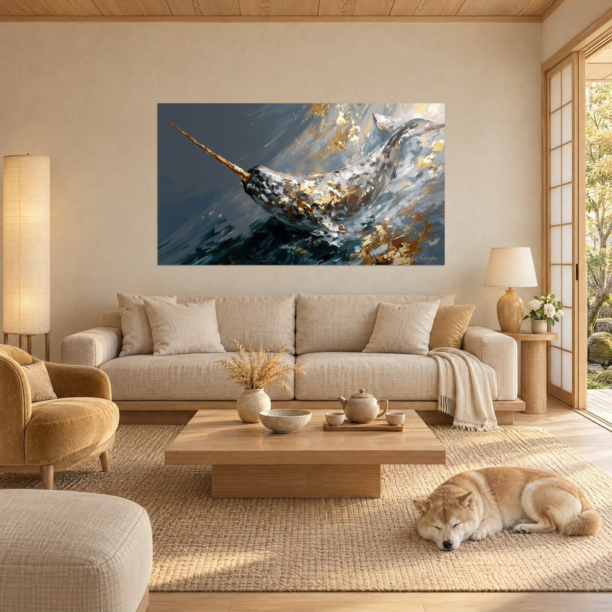 Wall art narwhal with gold and silver highlights, golden tusk on anthracite background, above a sofa in a bright living room