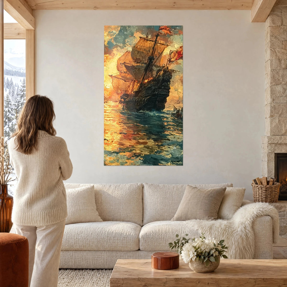 Gemälde Galeone mit gebauschten ockerfarbenen Segeln, schwarzer Rumpf auf goldenem und türkisfarbenem Meer, Frau von hinten, über einem Sofa in einem hellen Wohnzimmer