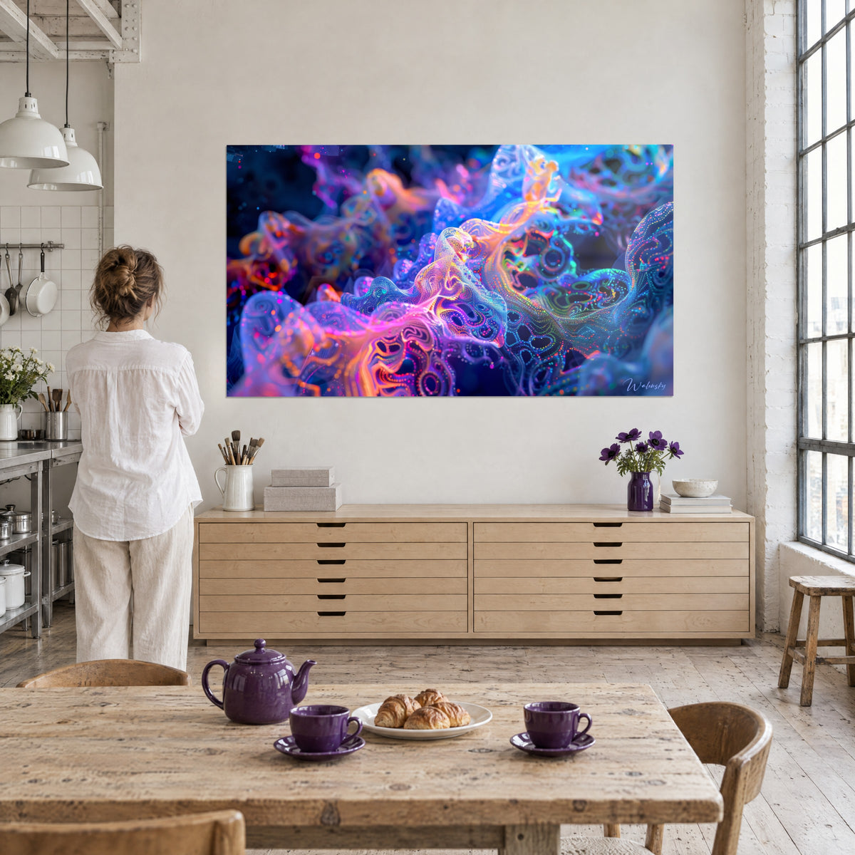 Wall art neuron nebula with sparkling yellow and cyan points, a woman seen from behind in front of an artist's loft