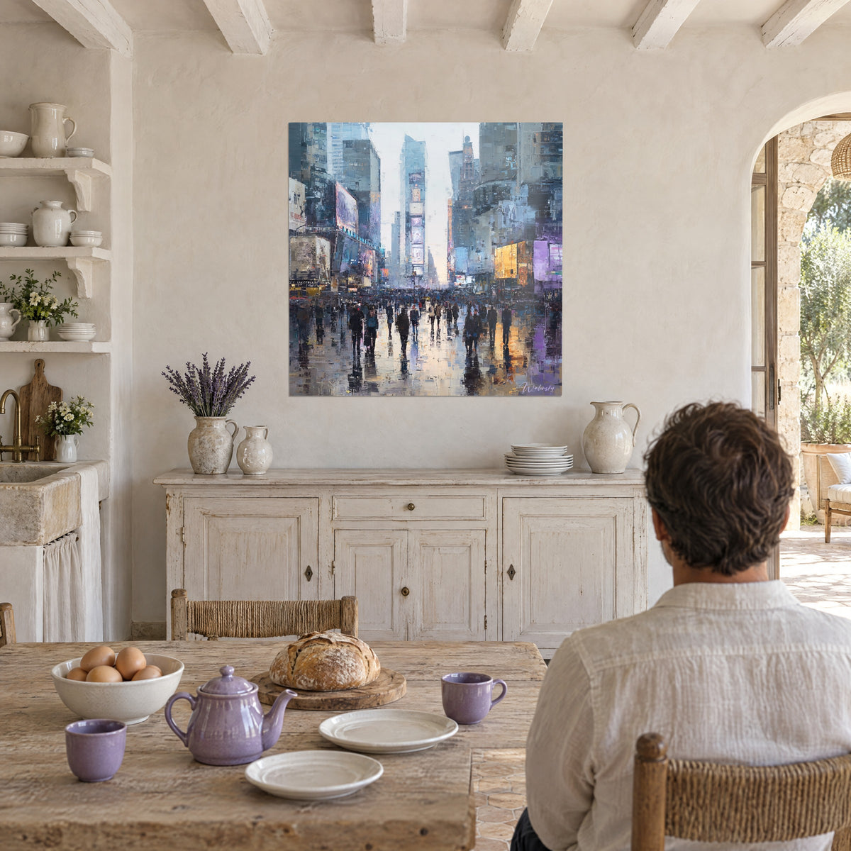 Wall art urban crowd in orange and mauve reflections, buildings in grey and blue palette-knife strokes, seen from the farmhouse kitchen table