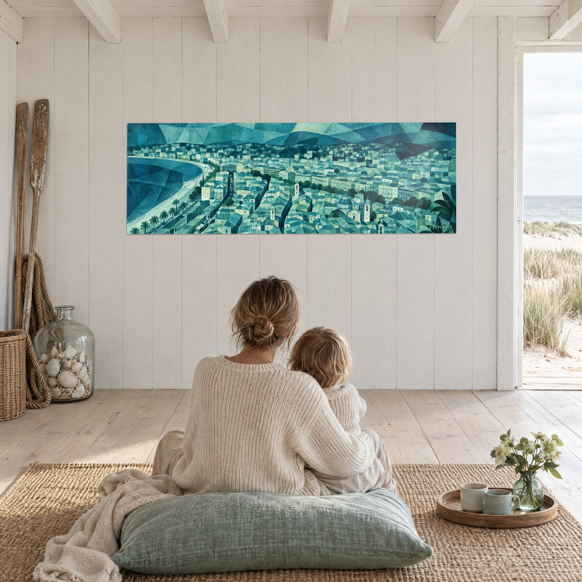 Quadro Nizza vista dal cielo, tetti turchesi e cielo angolare blu-verde, ammirati da una madre e dal suo bambino di spalle, seduti su un grande cuscino