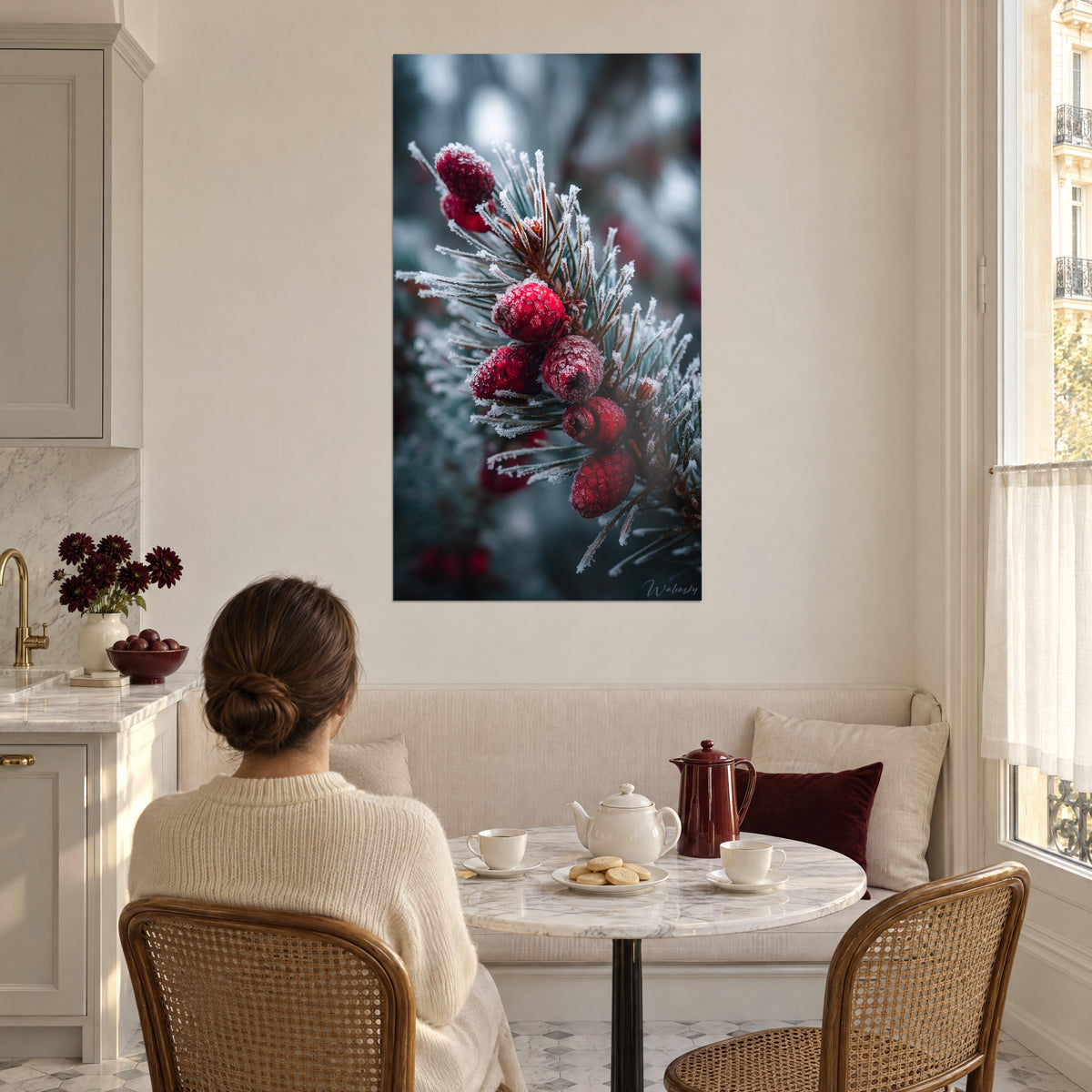 Wall art of a cluster of scarlet berries and frosted needles, teal and vivid red, facing a sunny dining nook