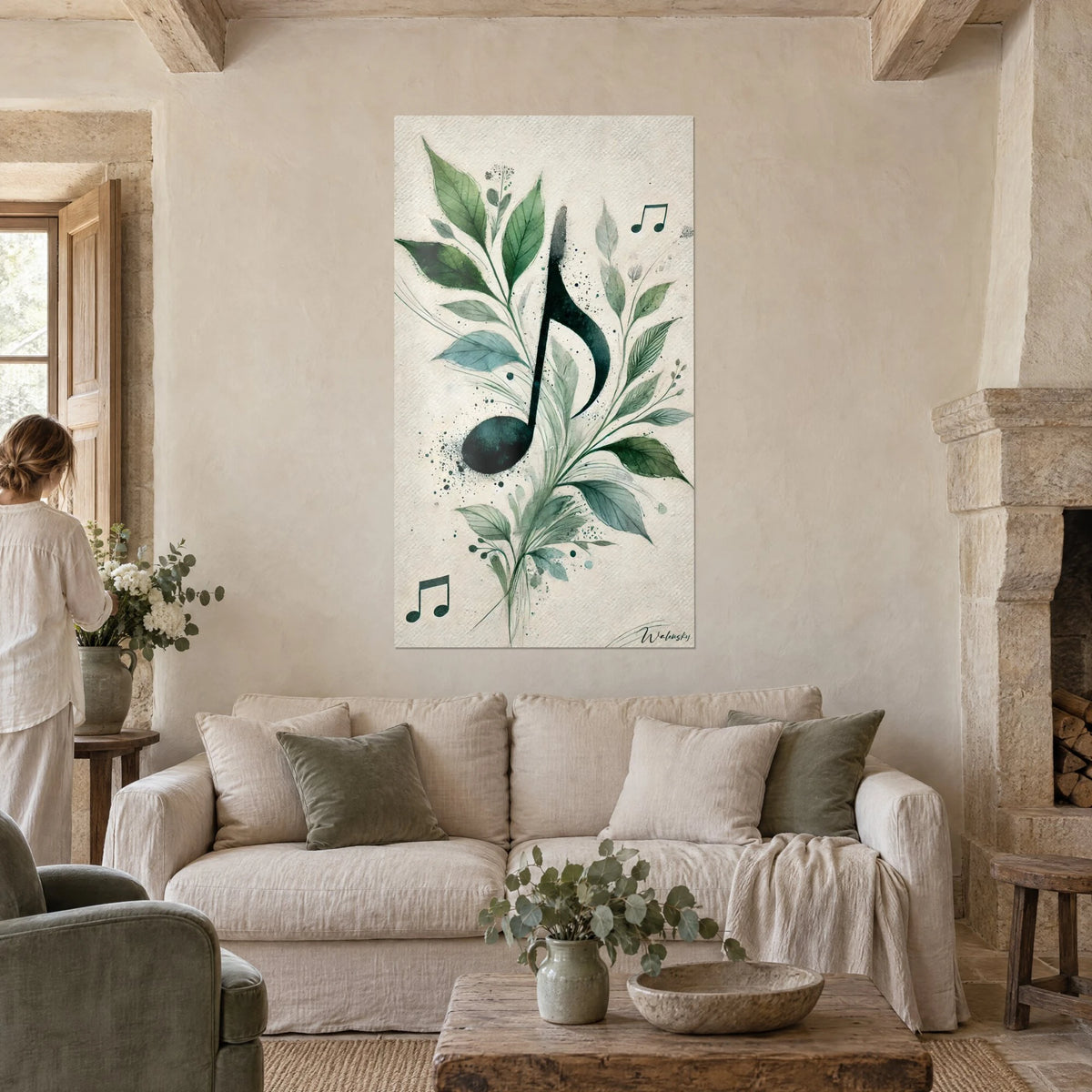 Tableau note de musique et branches vert forêt sur fond crème, deux notes en haut et en bas, au-dessus d'un canapé dans un salon lumineux
