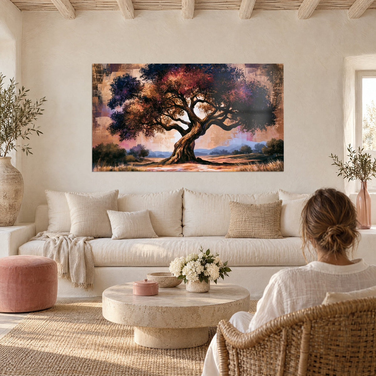 Wall art of a gnarled olive tree with purple and indigo foliage, twisted brown trunk, checkered ochre background, above a sofa in a bright living room