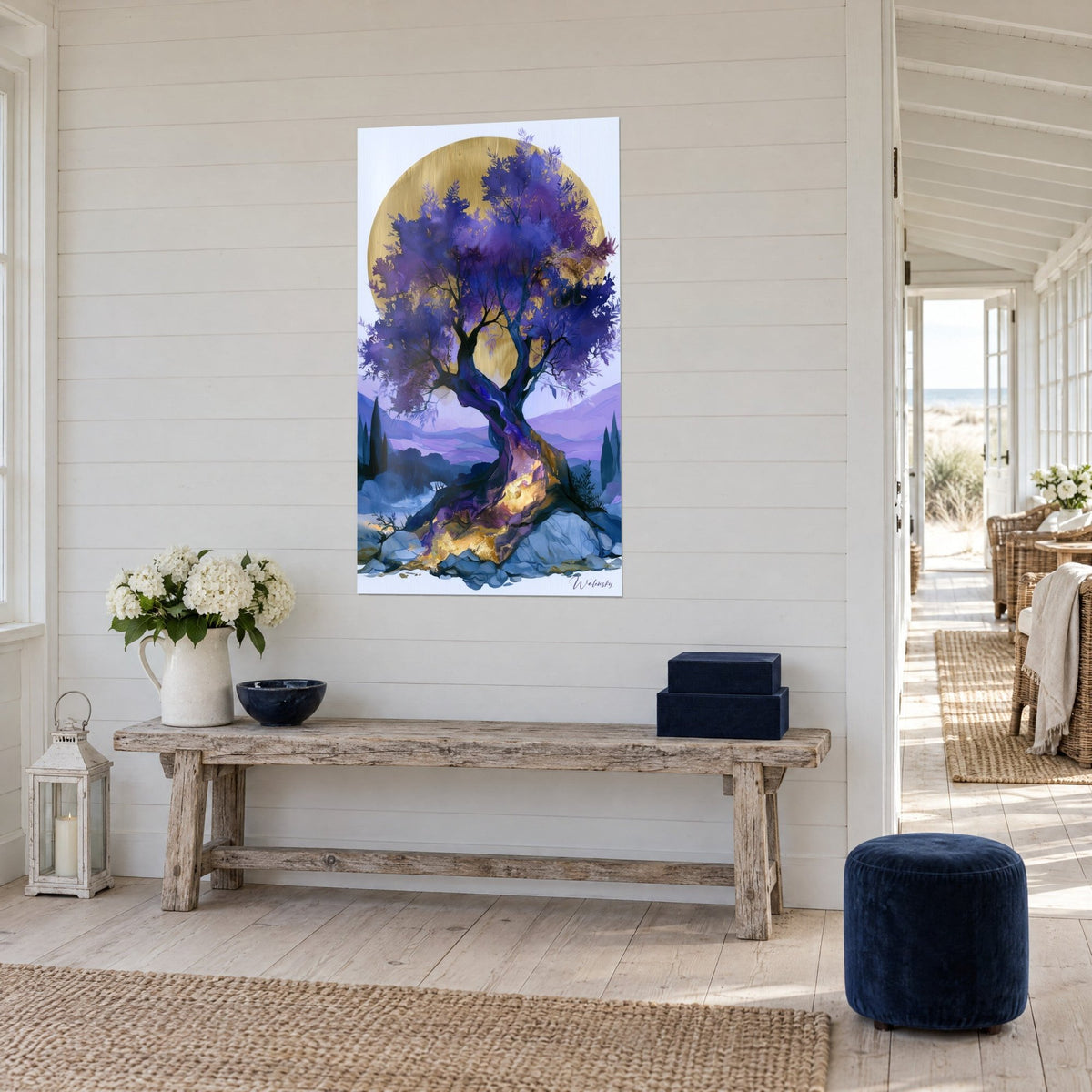 Wall art twisted tree in indigo and lilac tones, golden sap on the trunk, on a white panelled wall, seaside house