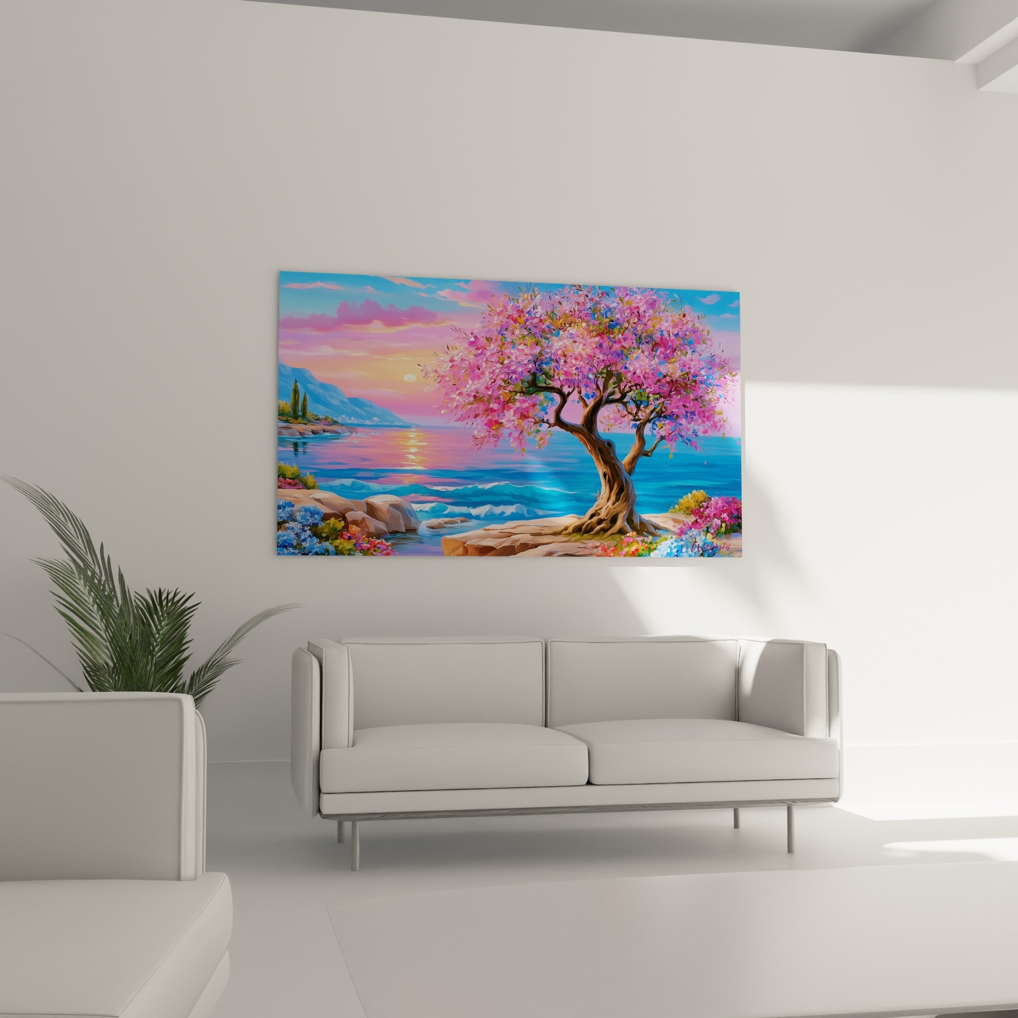 Branches roses et pétales mauves d'un olivier côtier au-dessus d'un canapé dans un salon lumineux