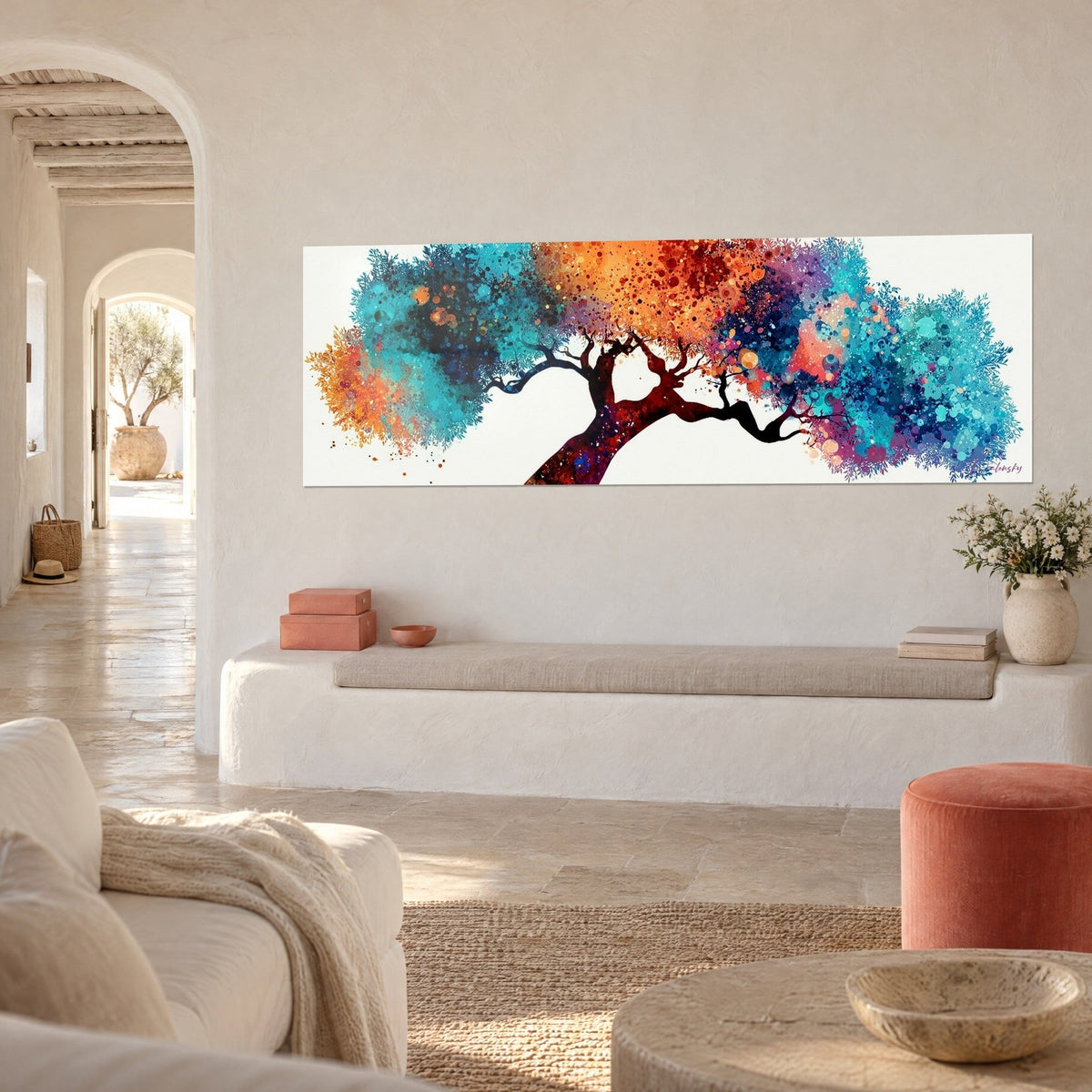 Wall art twisted tree with indigo and ochre paint splatters, burgundy trunk, on a white wall of a Mediterranean house
