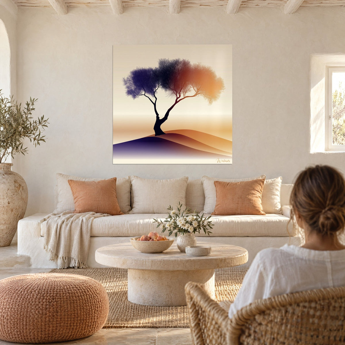 Wall art solitary olive tree with violet and orange foliage on a dune, above a sofa in a bright living room