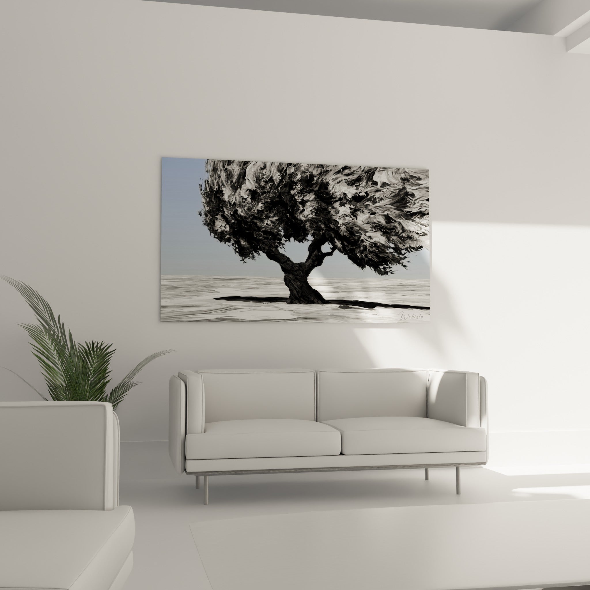 Arbre solitaire aux branches tourmentées grises et anthracite au-dessus d'un canapé dans un salon lumineux