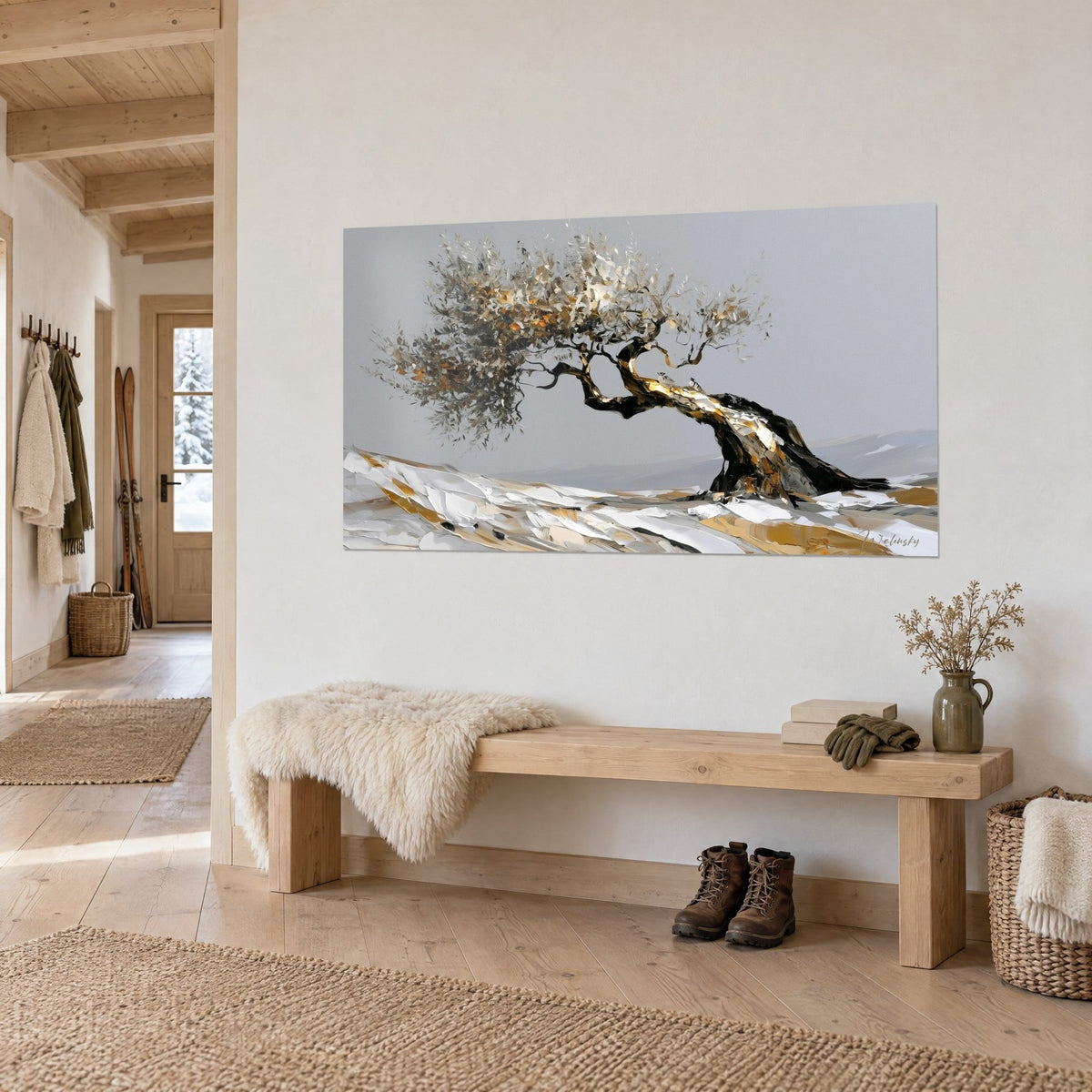 Cuadro de un árbol inclinado de follaje plateado y ocre, suelo de nieve blanca en empastes gruesos, colgado en la entrada de un chalet de madera