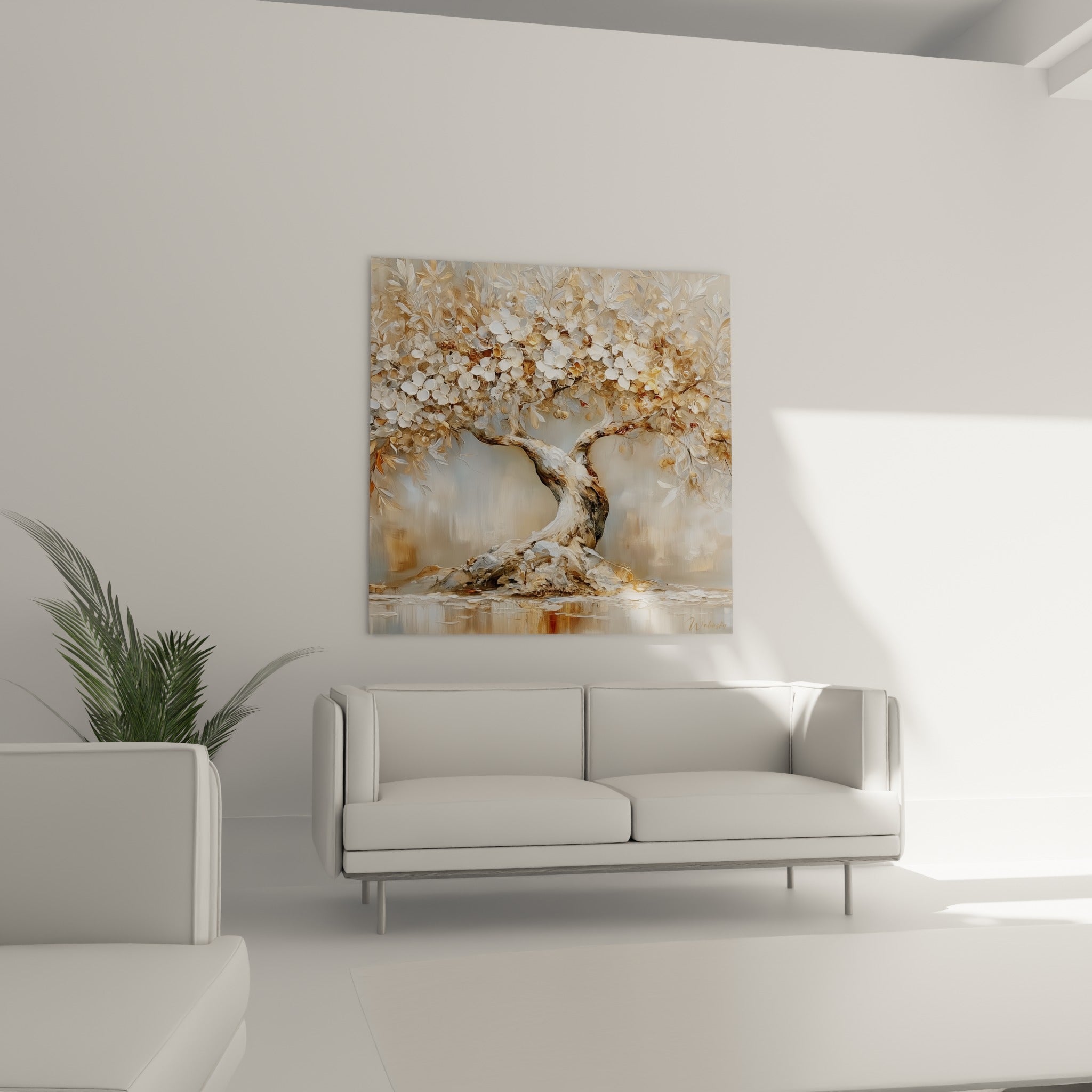 Floraison d'olivier ivoire et beige accrochée au-dessus d'un canapé dans un salon lumineux