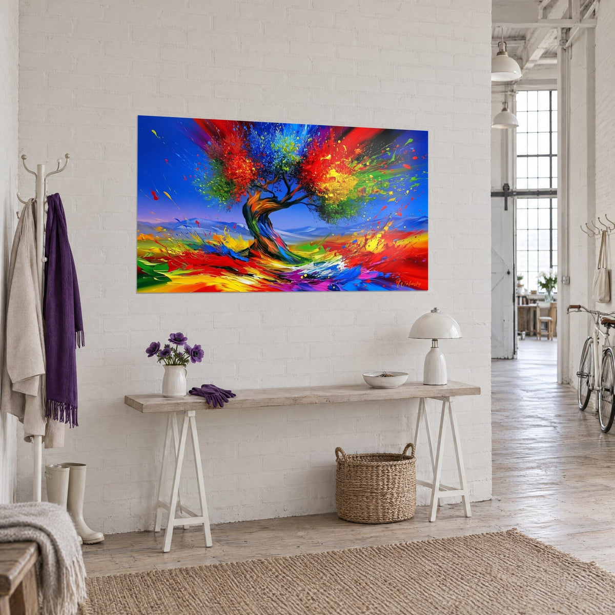 Quadro albero tormentato con schizzi di pittura gialla e verde su cielo azzurro, appeso a un muro di mattoni bianchi, loft d'artista
