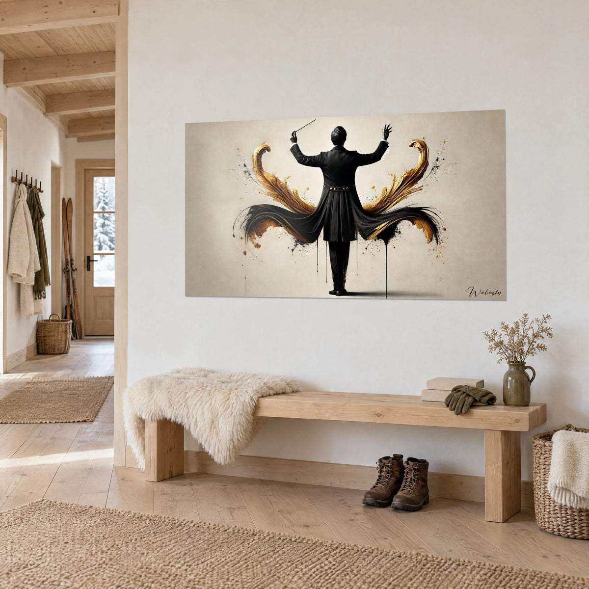 Tableau silhouette noire à baguette dressée, ailes d'or et d'encre déployées sur beige clair, au mur d'un chalet vu de trois-quarts