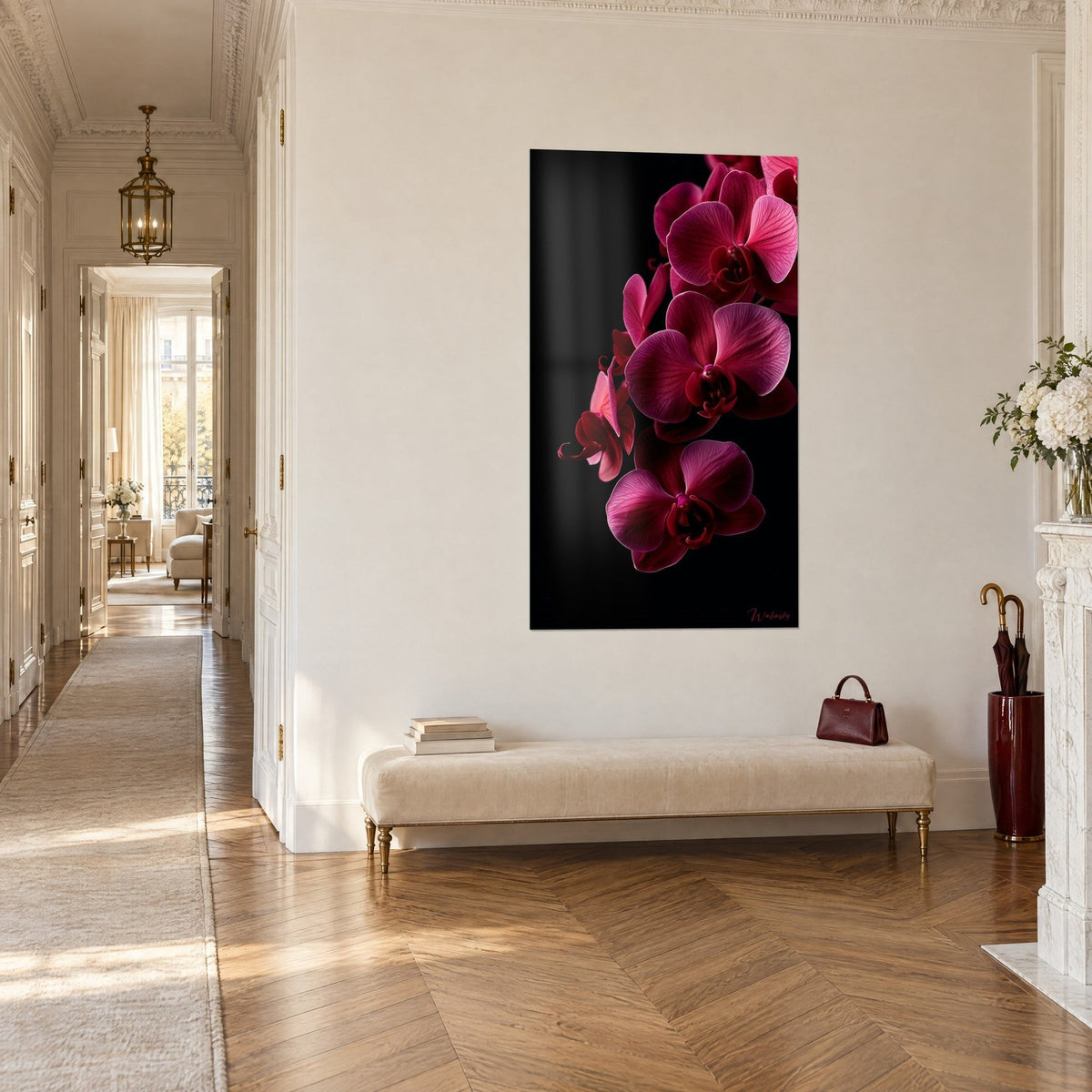 Wall art fuchsia and magenta phalaenopsis orchid cluster on deep black, Haussmann-style corridor and beige banquette in three-quarter view