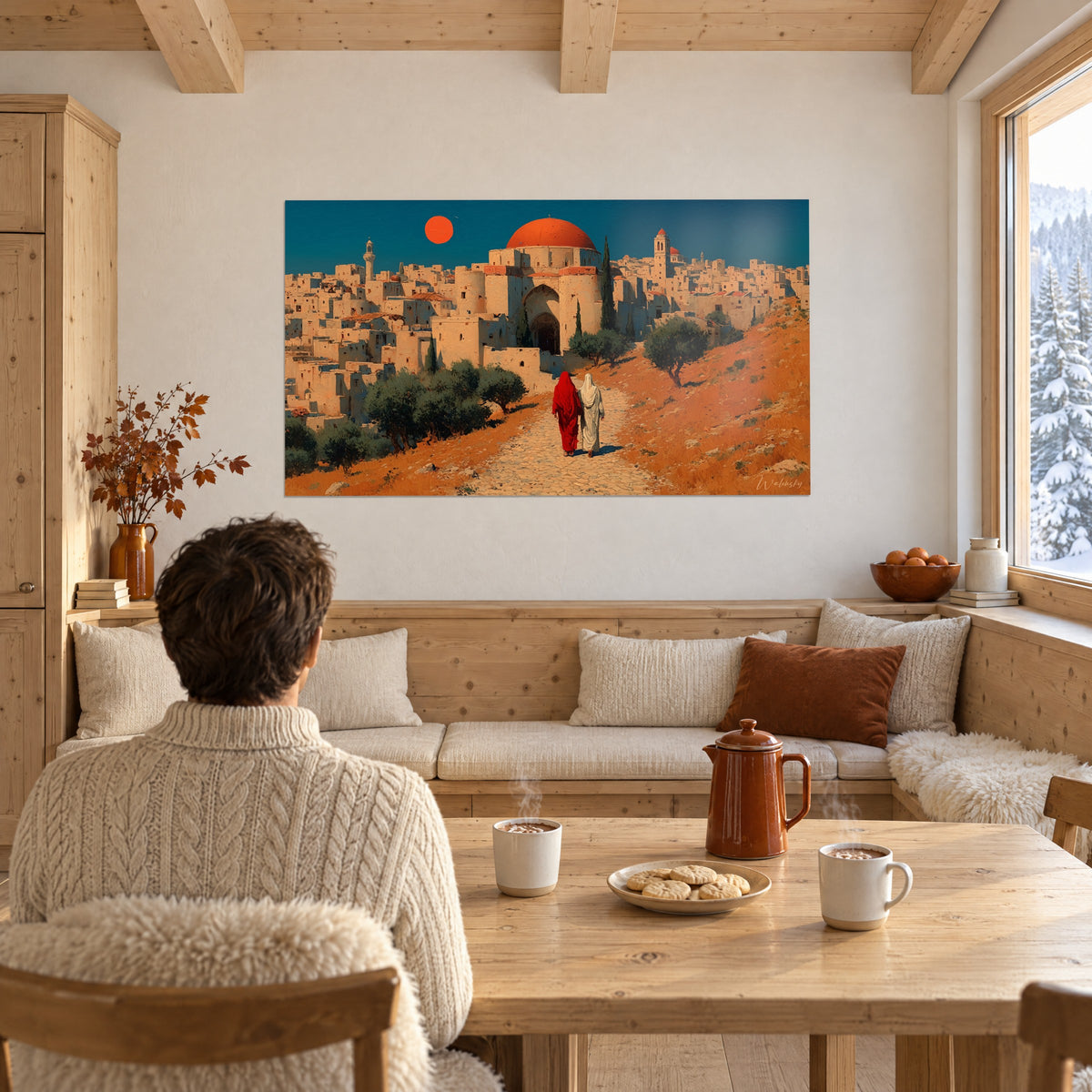 Quadro coppia con veli rossi e bianchi che scende un sentiero lastricato verso una moschea con cupola arancione, appeso accanto a un tavolo di legno di chalet