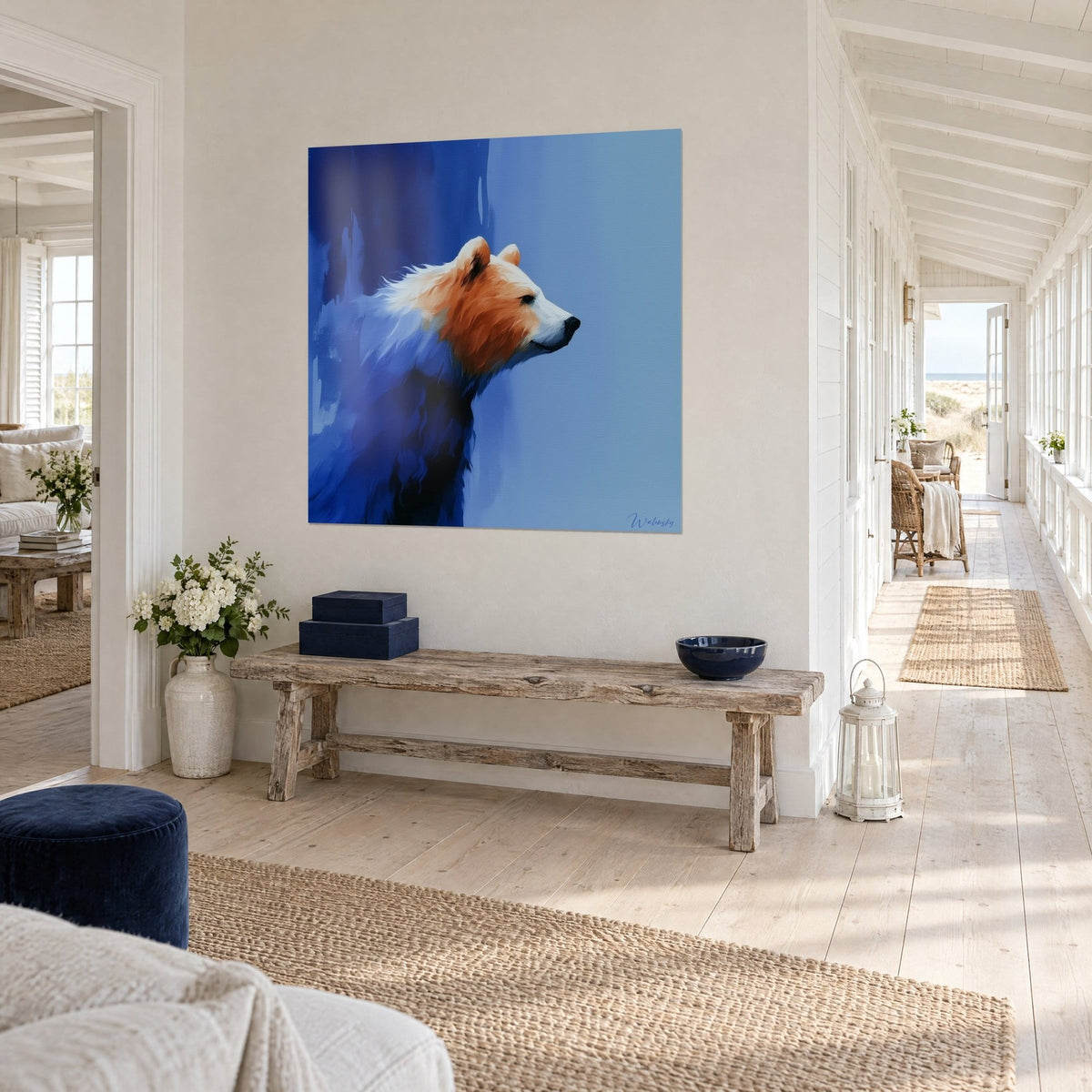 Wall art orange and white furred bear against a sky-blue background, in perspective at the end of a seaside hallway