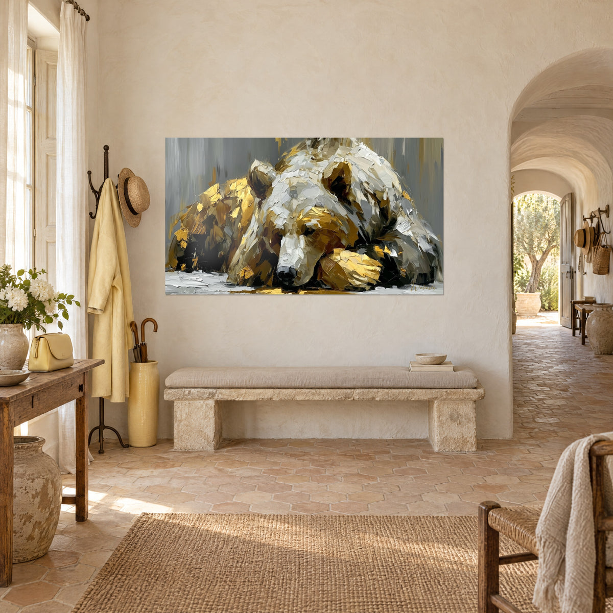 Wall art of a giant sleeping bear in ochre and white knife strokes, round black ear, grey background; vaulted entrance, stone bench