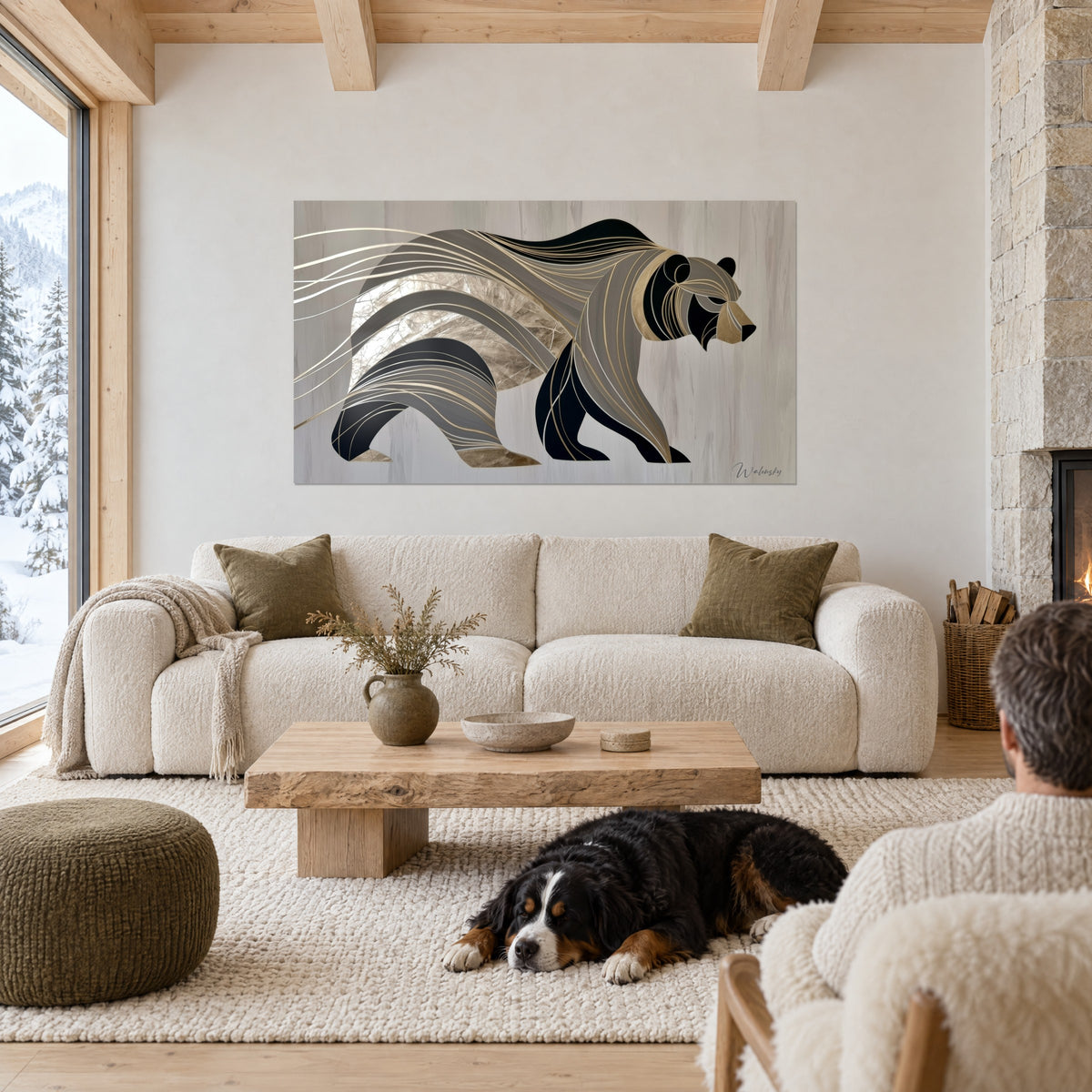 Wall art stylised bear in grey, black and silver stripes, gold fine lines, with a dog lying down, above a sofa in a bright living room