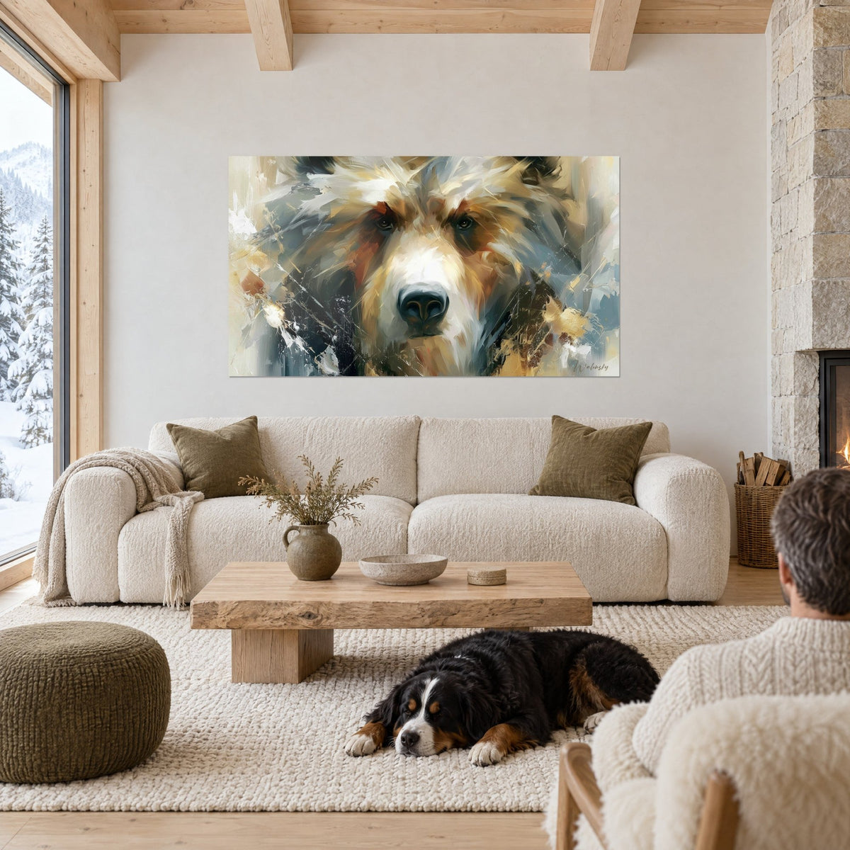 Gemälde Braunbär mit dunklem Blick, ockerfarbenes und graublaues Fell, eine Person von hinten und ein Hund, cremefarbenes Sofa über einer Couch in einem hellen Wohnzimmer