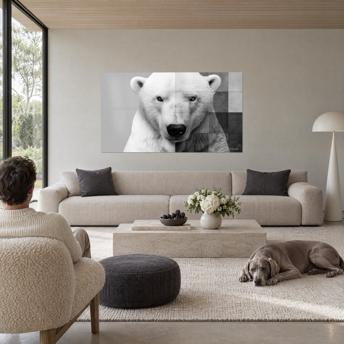 Wall art polar bear with an icy gaze, white fur and grey mosaic, man seen from behind and Weimaraner, above a sofa in a bright living room