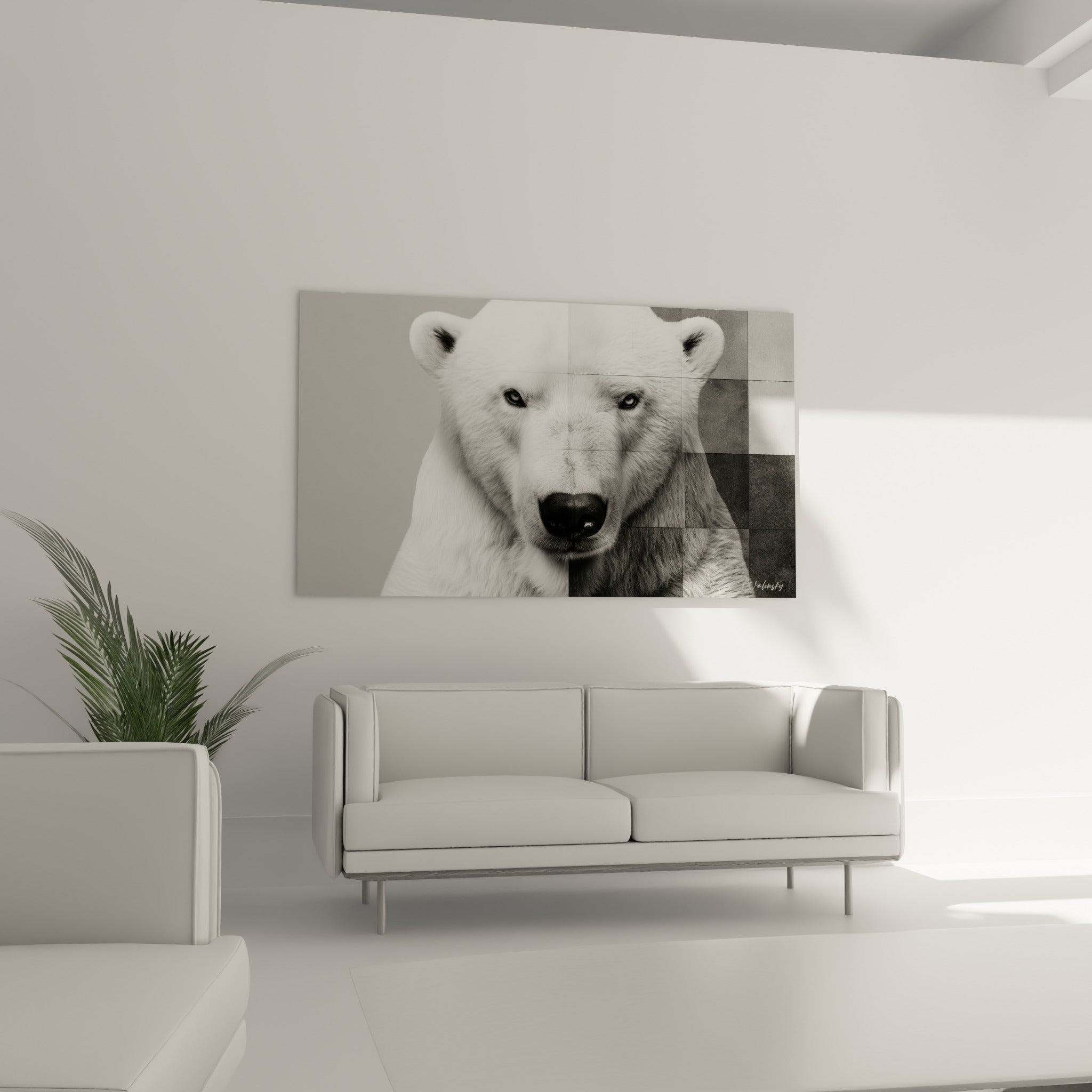 Visage d'ours polaire en noir et blanc affiché au-dessus d'un canapé dans un salon lumineux