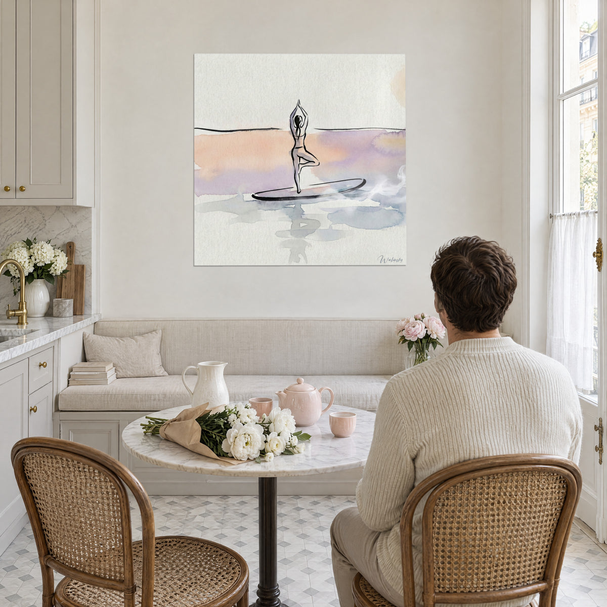Wall art athletic woman balancing on her board, blue-grey reflection, peach and lilac background, man seated at a table seen from behind, bright kitchen and pink peonies