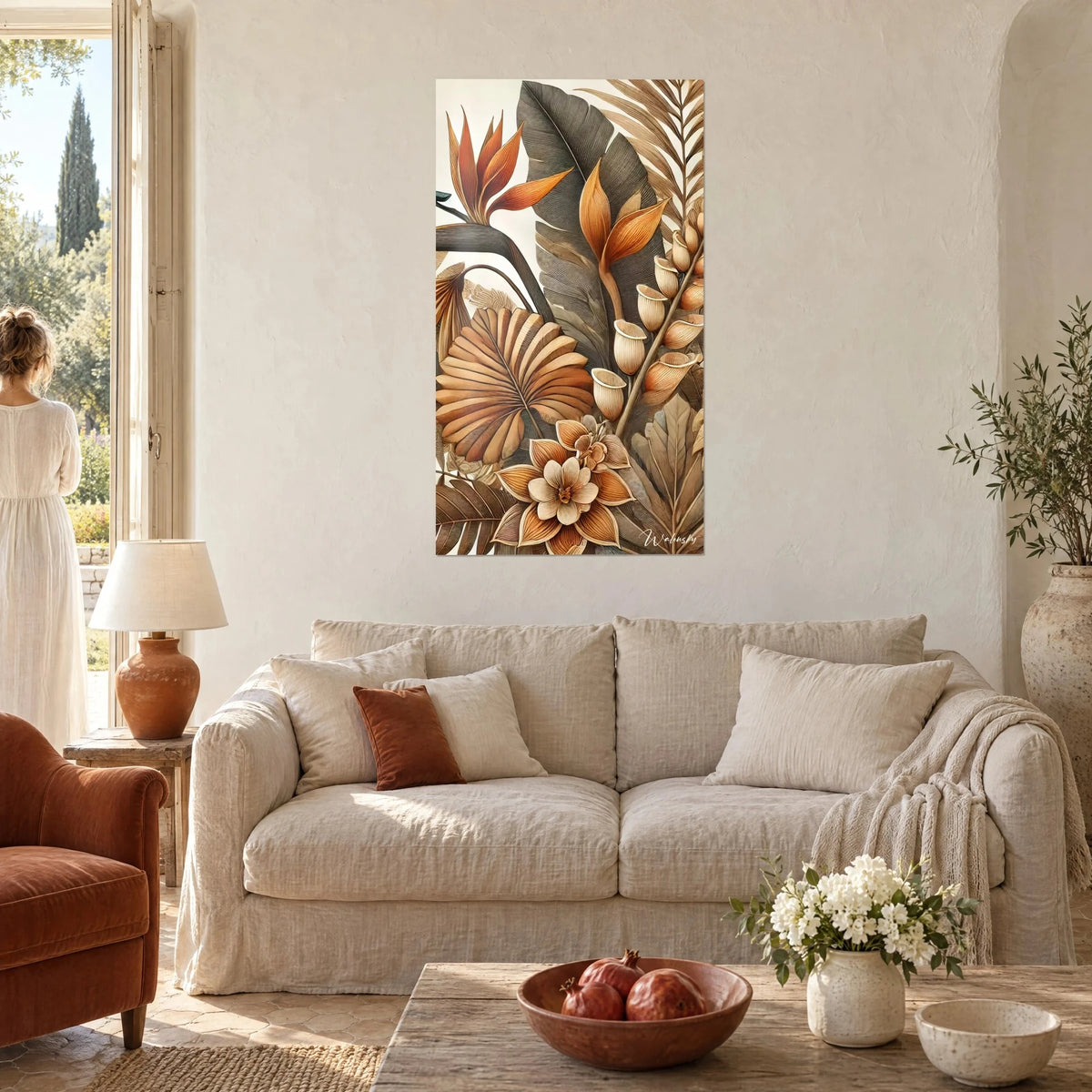 Wall art with carved tropical foliage in copper and smoked grey tones, bird of paradise flower, hung above a sofa in a bright living room