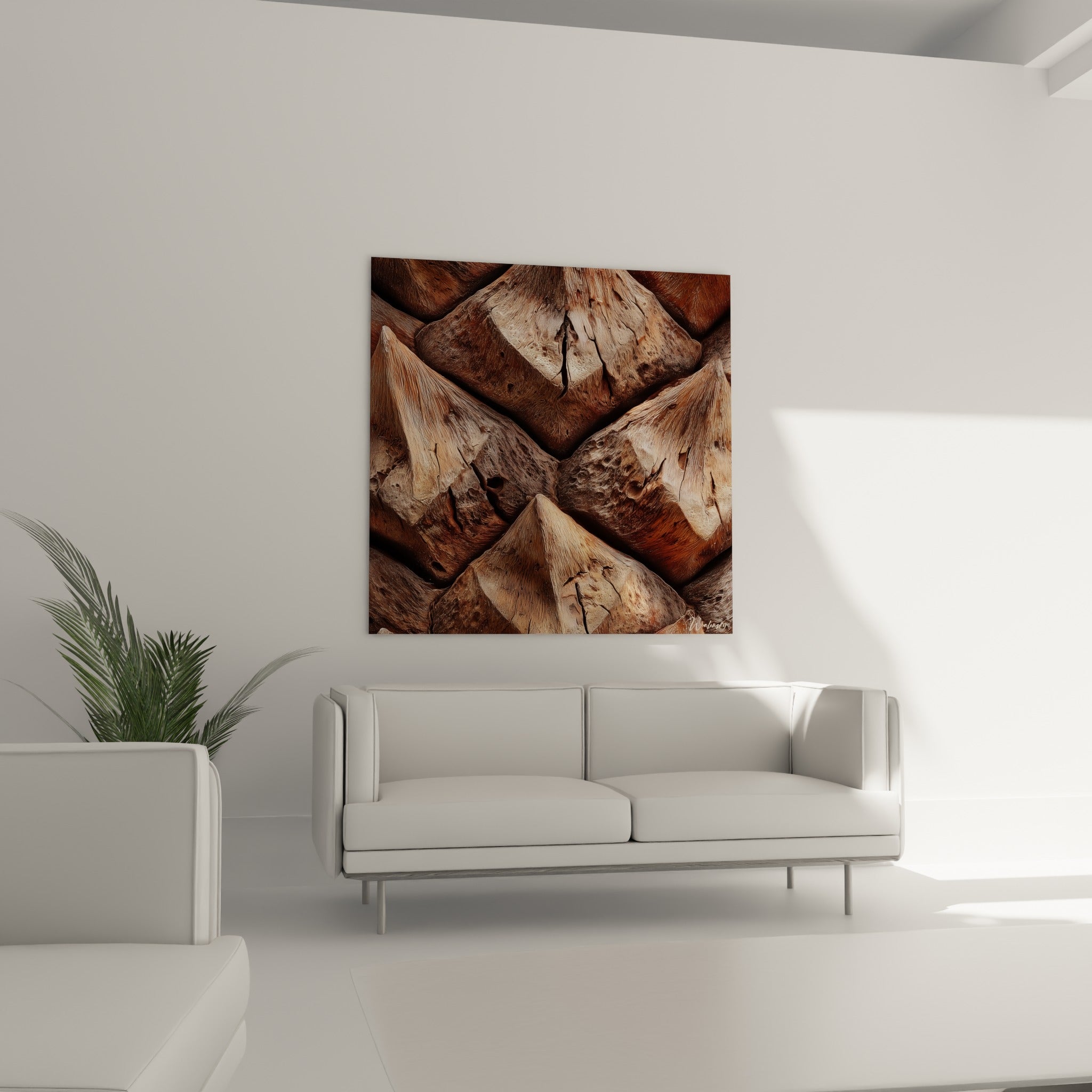 Motifs d'écorce de Palmier ocre et brune disposés au-dessus d'un canapé dans un salon lumineux