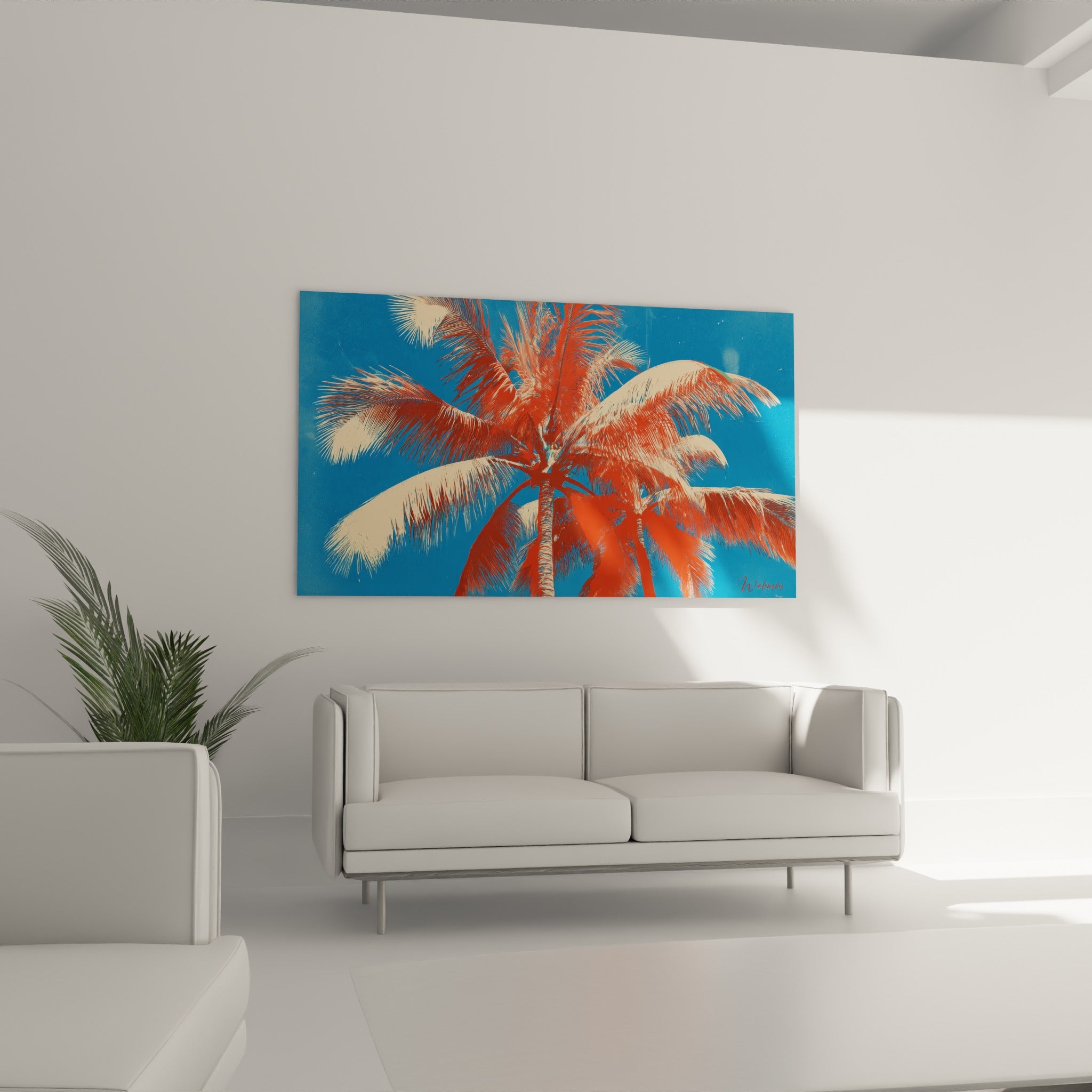 Envolée de palmes rouge corail sur ciel bleu intense au-dessus d'un canapé dans un salon lumineux