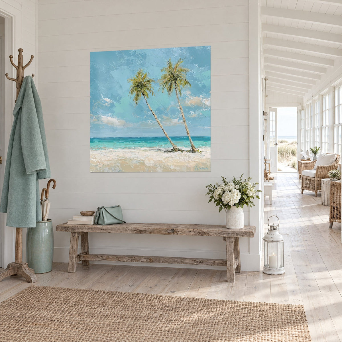 Wall art twin palm trees with olive-green fronds, turquoise sea and textured pale blue sky, three-quarter view in a seaside house hallway