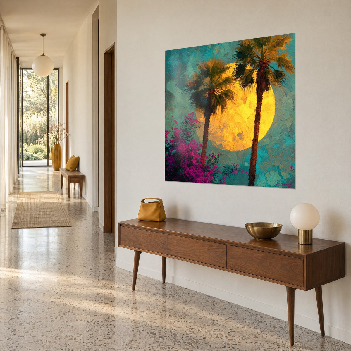Wall art of a tropical night painted in thick brushstrokes, golden moon, turquoise sky, fuchsia flowers, on a beige wall beside a wooden sideboard