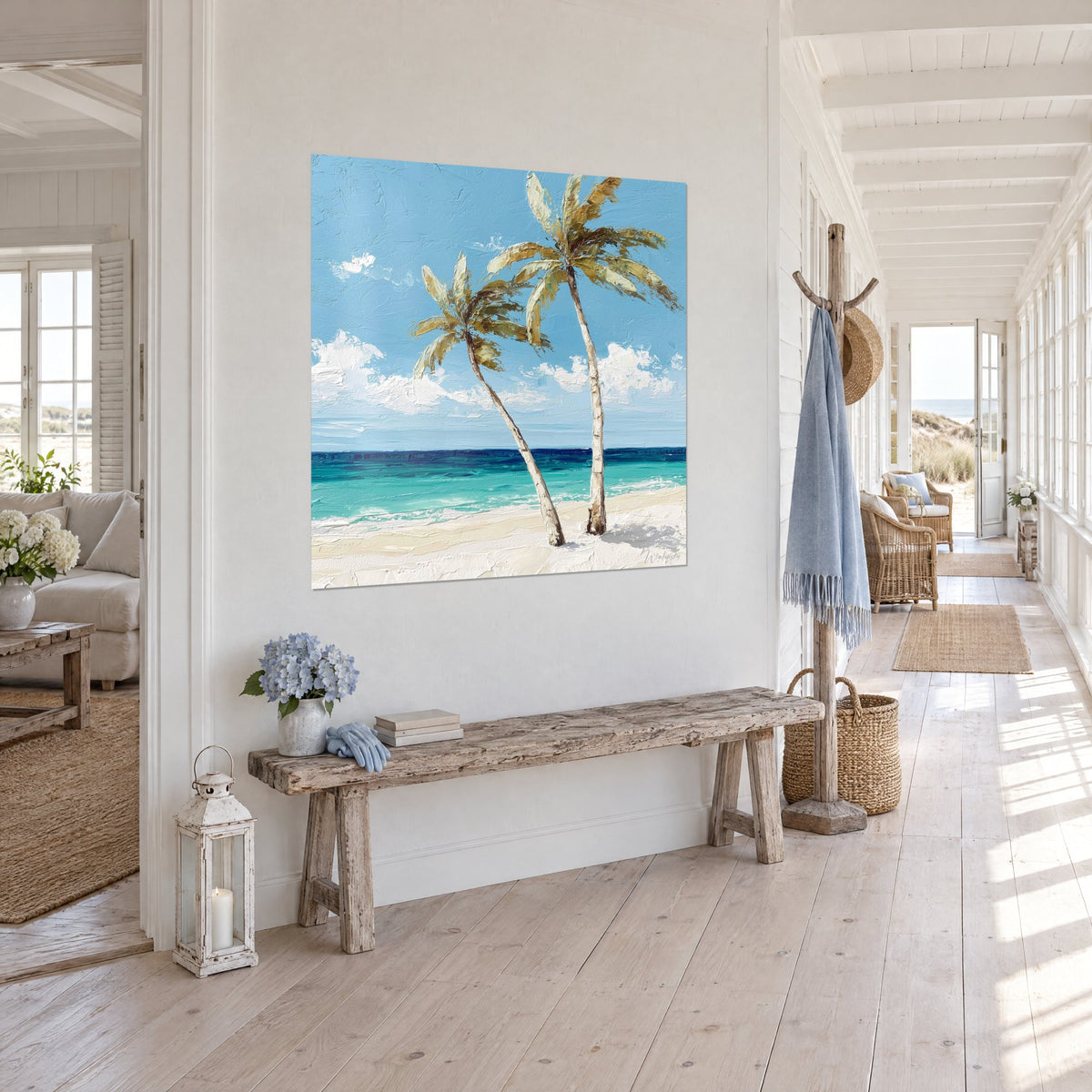 Wall art of twin palms with golden fronds over ivory sand, turquoise and navy sea, bright hallway and wooden bench