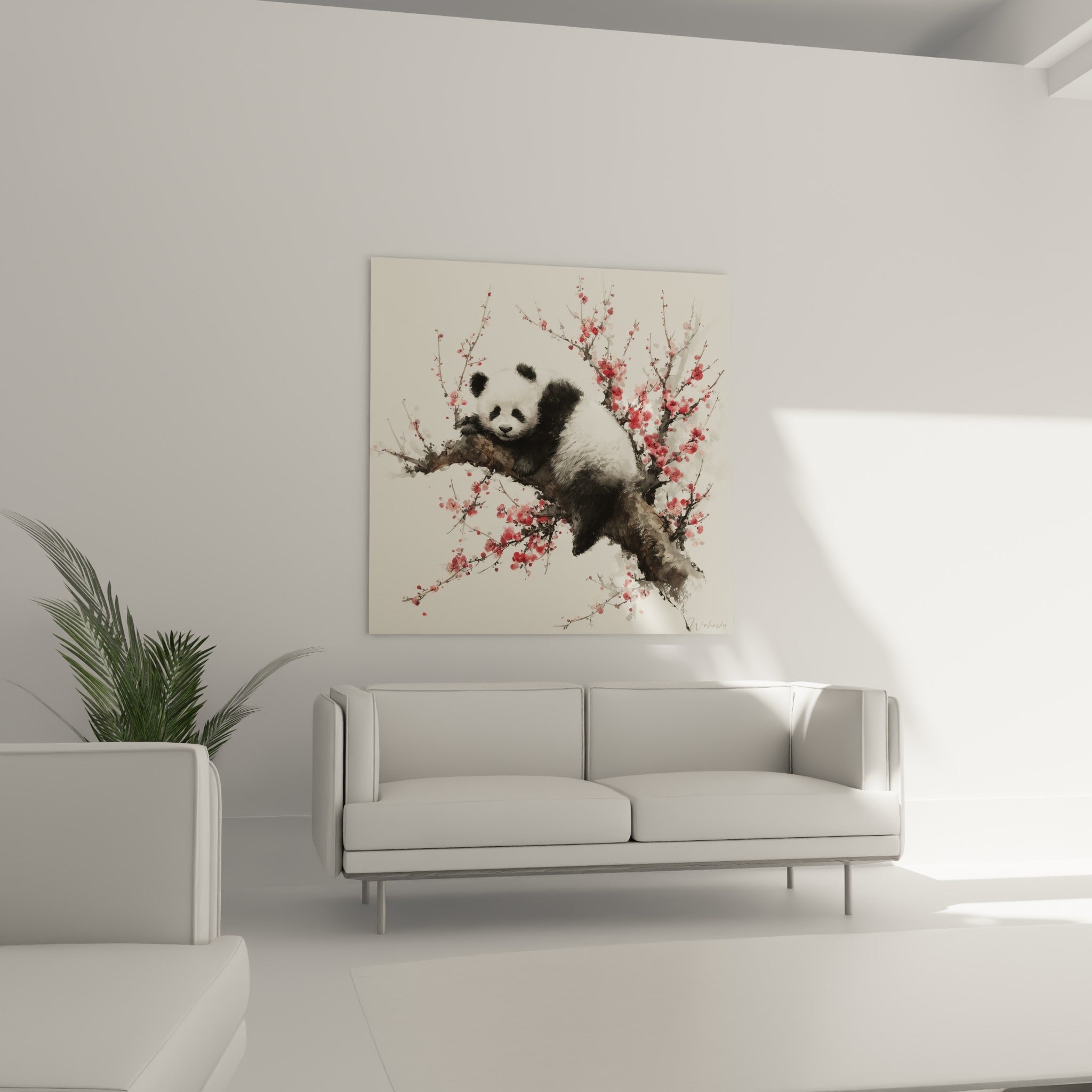 Petit panda noir et blanc niché sur une branche fleurie, au-dessus d'un canapé dans un salon lumineux