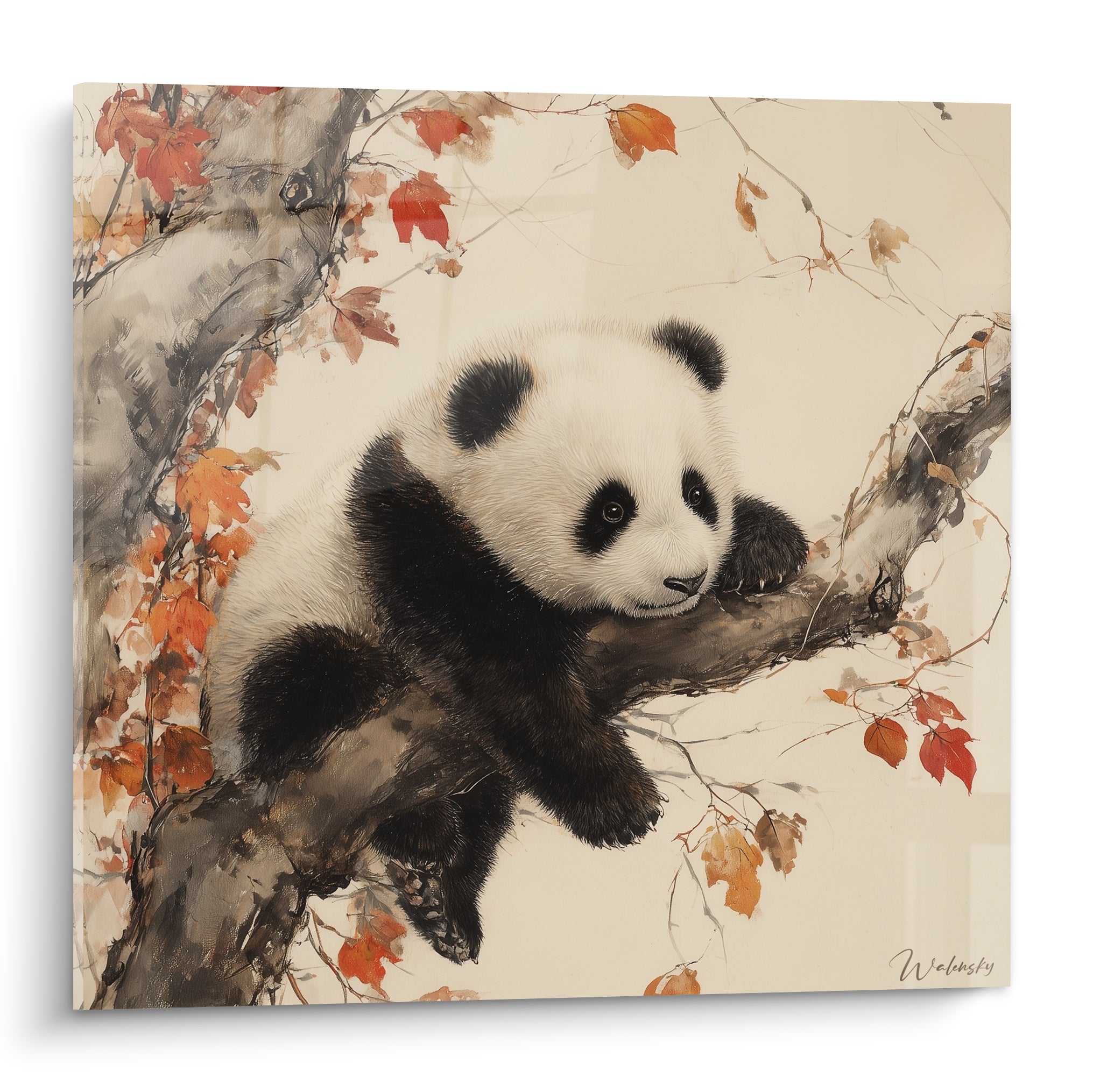 Panda blanc et noir allongé sur une branche grise, entouré de feuilles orangées et fond crème