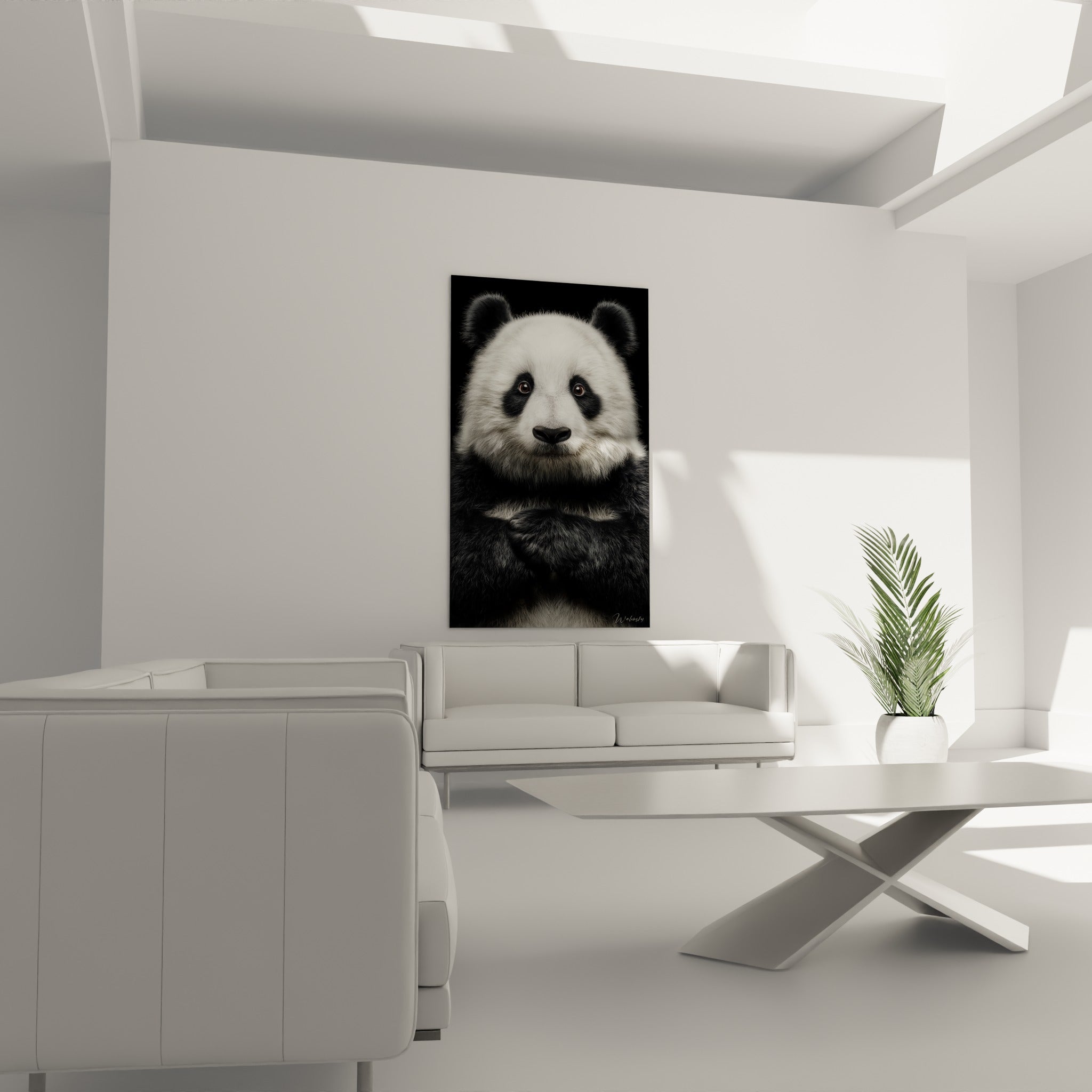 Museau noir et pelage blanc du panda posé, au-dessus d'un canapé dans un salon lumineux