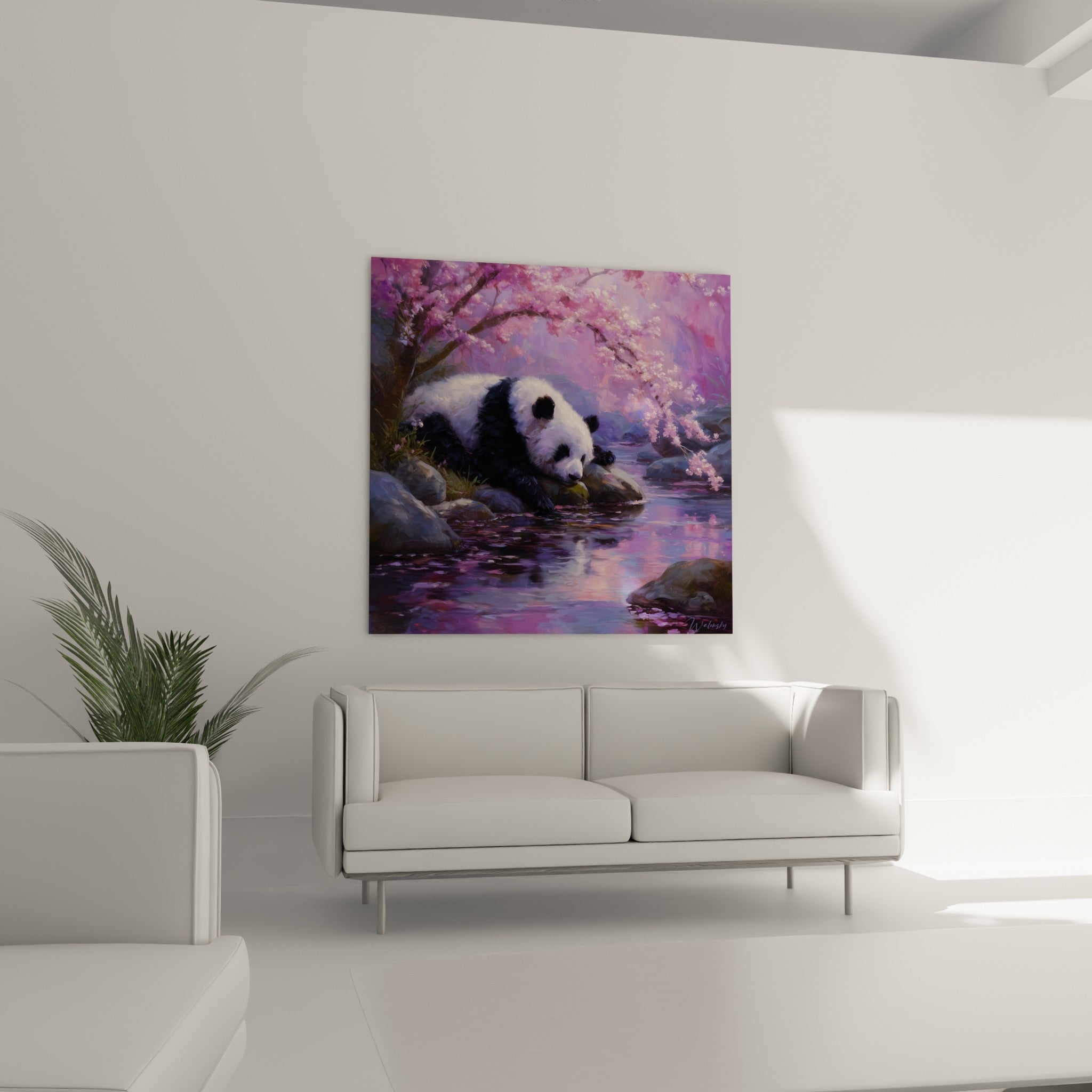Silhouette de panda au bord de l'eau, tons roses et violets, au-dessus d'un canapé dans un salon lumineux