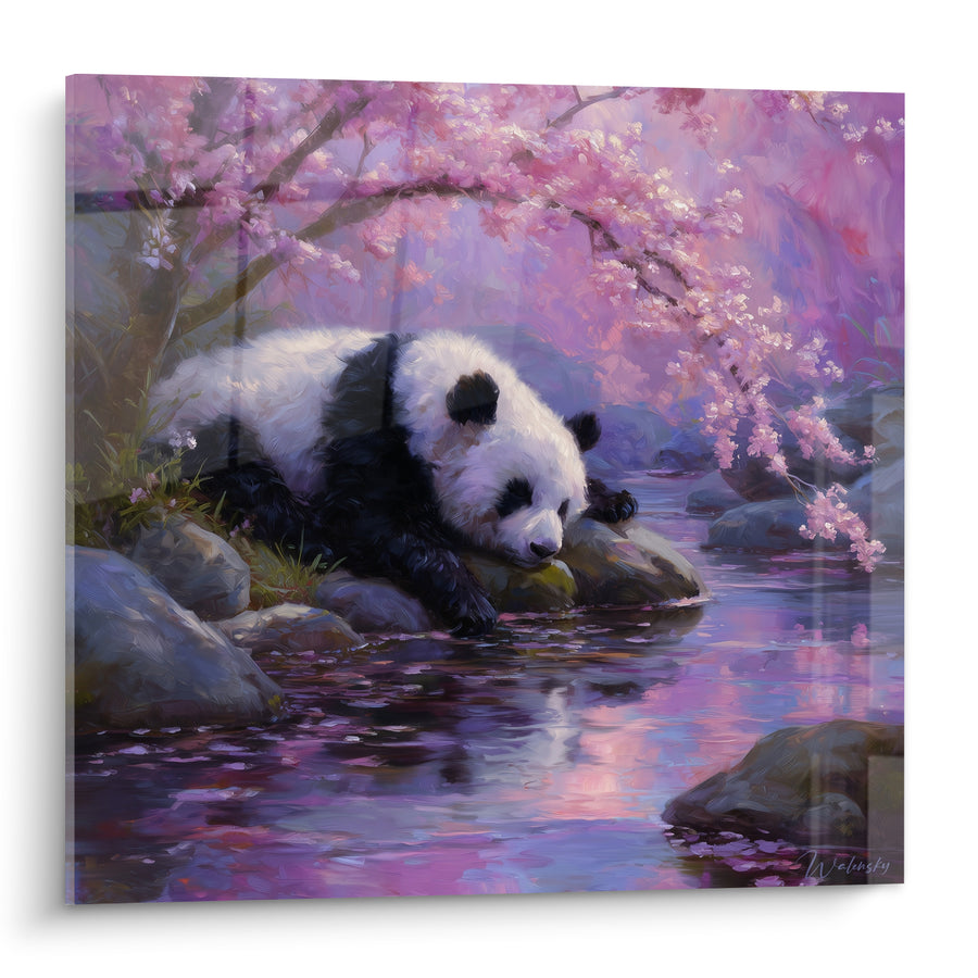 Tableau Panda noir et blanc allongé au bord d'une rivière - Rochers et pétales flottants - Edition Panda