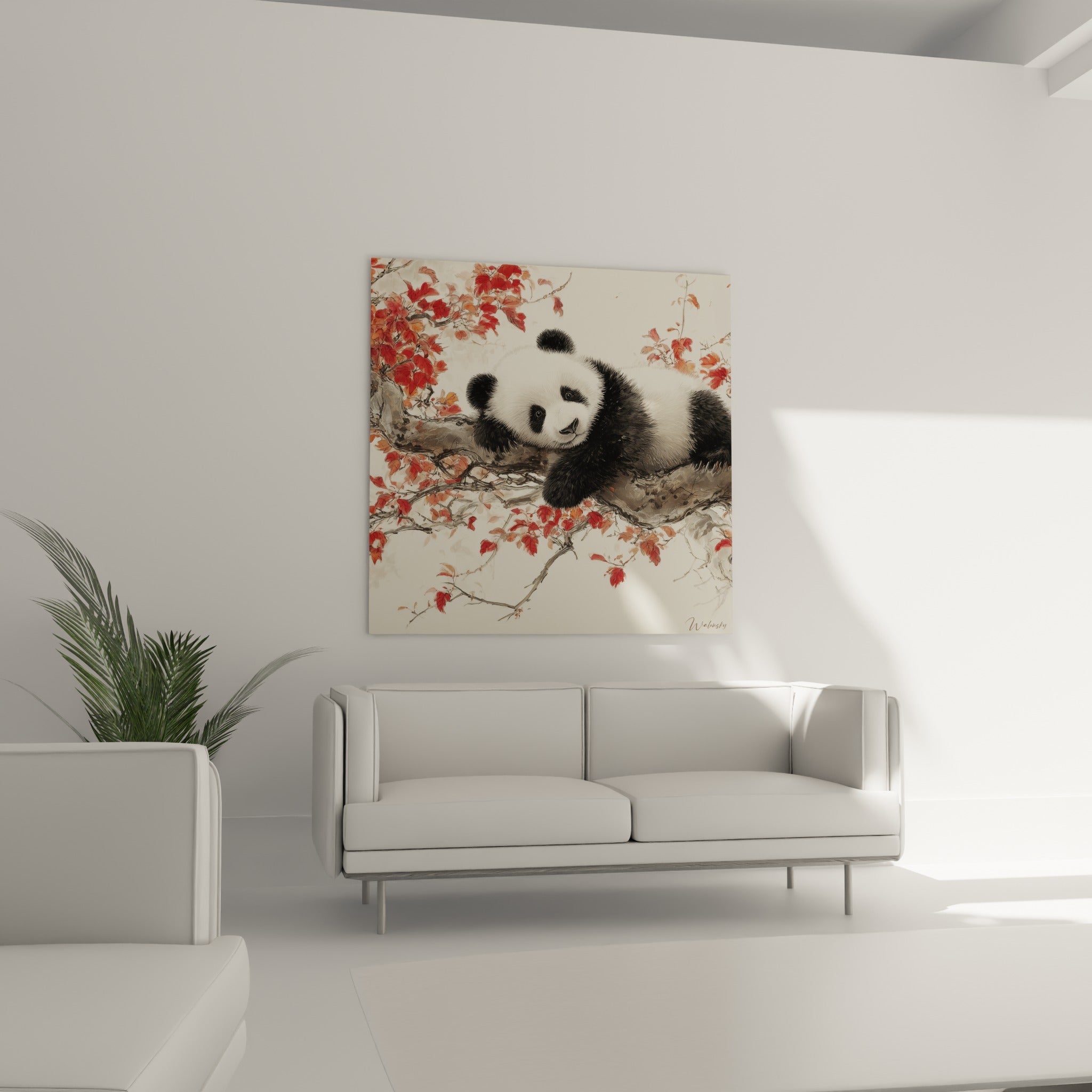 Panda détendu entre feuillages rouges et terracotta, au-dessus d'un canapé dans un salon lumineux
