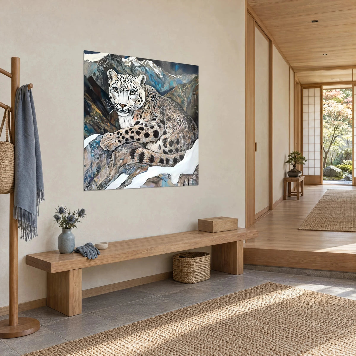 Wall art white leopard lying on a rock, crossed paws, black spots and pristine snow, beige wall of a japandi entryway seen three-quarter view