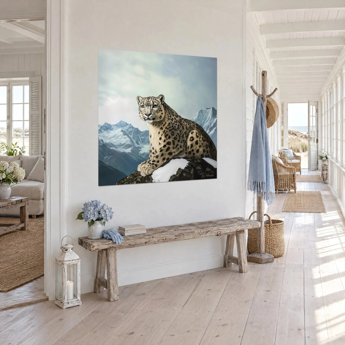 Wall art feline with amber eyes on a snowy rock, glacier-blue peaks, three-quarter view in a light hallway