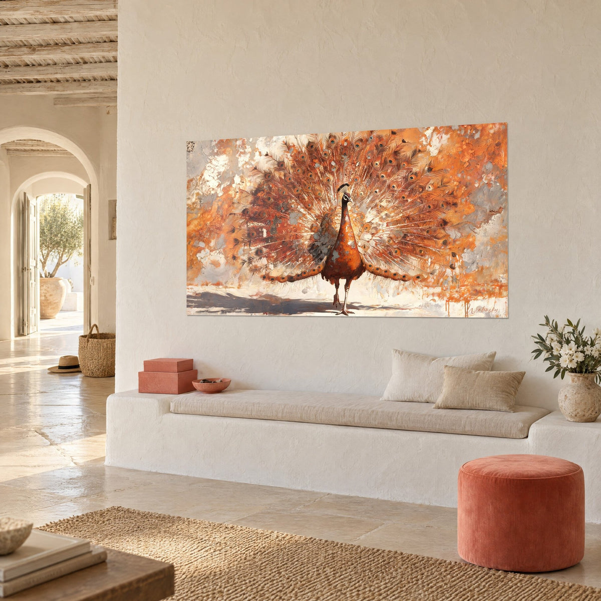 Wall art bird with orange and grey fan-shaped feathers, copper silhouette at the centre, on the white wall of a Mediterranean house