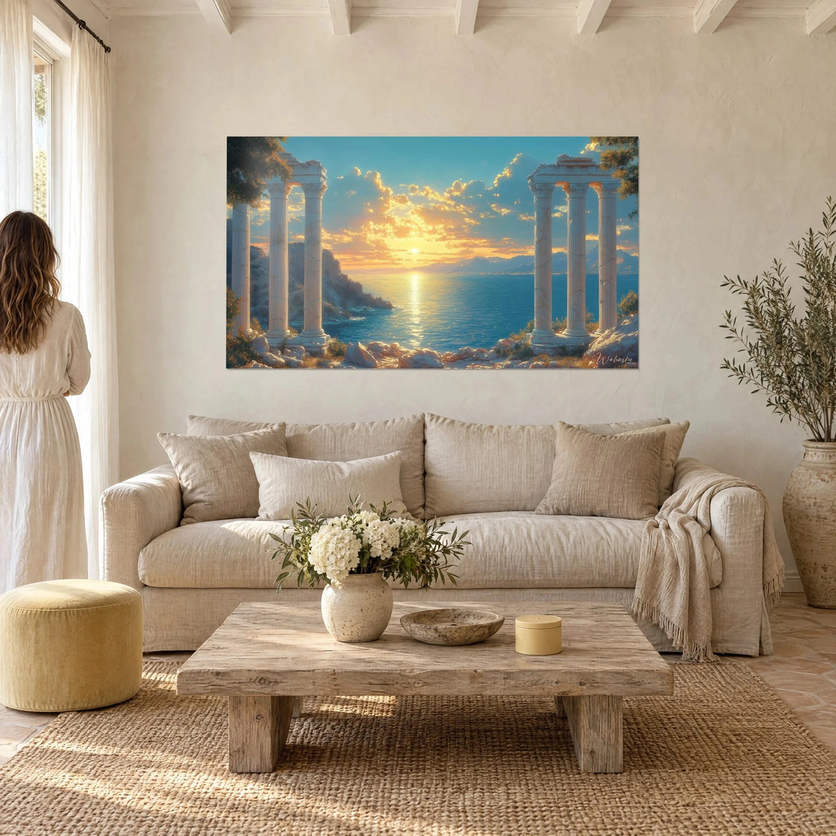 Wall art of marble columns veined with golden cracks facing a sapphire sea, above a sofa in a bright living room