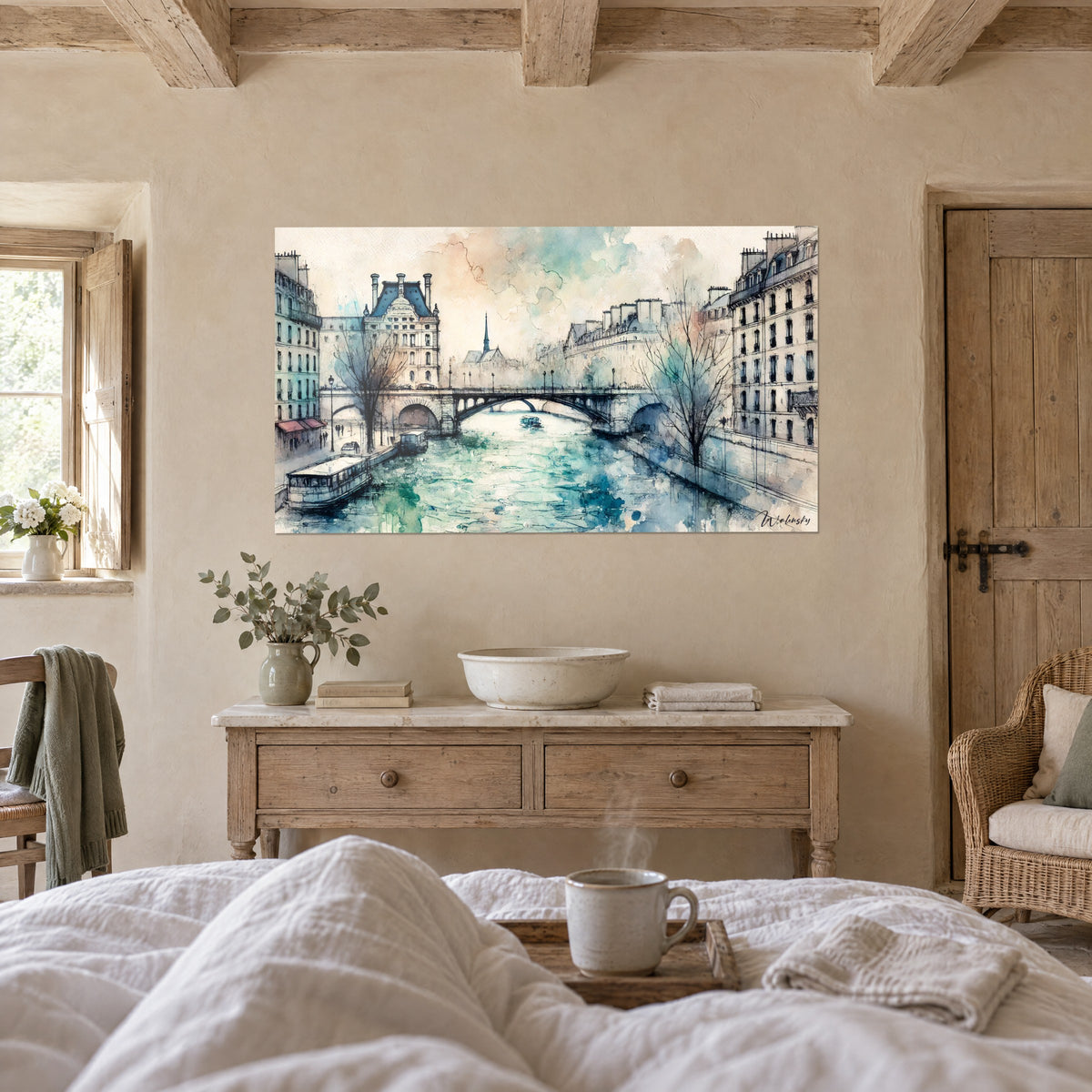Cuadro del río y edificios haussmannianos en tonos verde agua y rosa empolvado, puente en arco, sobre una cama en un dormitorio luminoso
