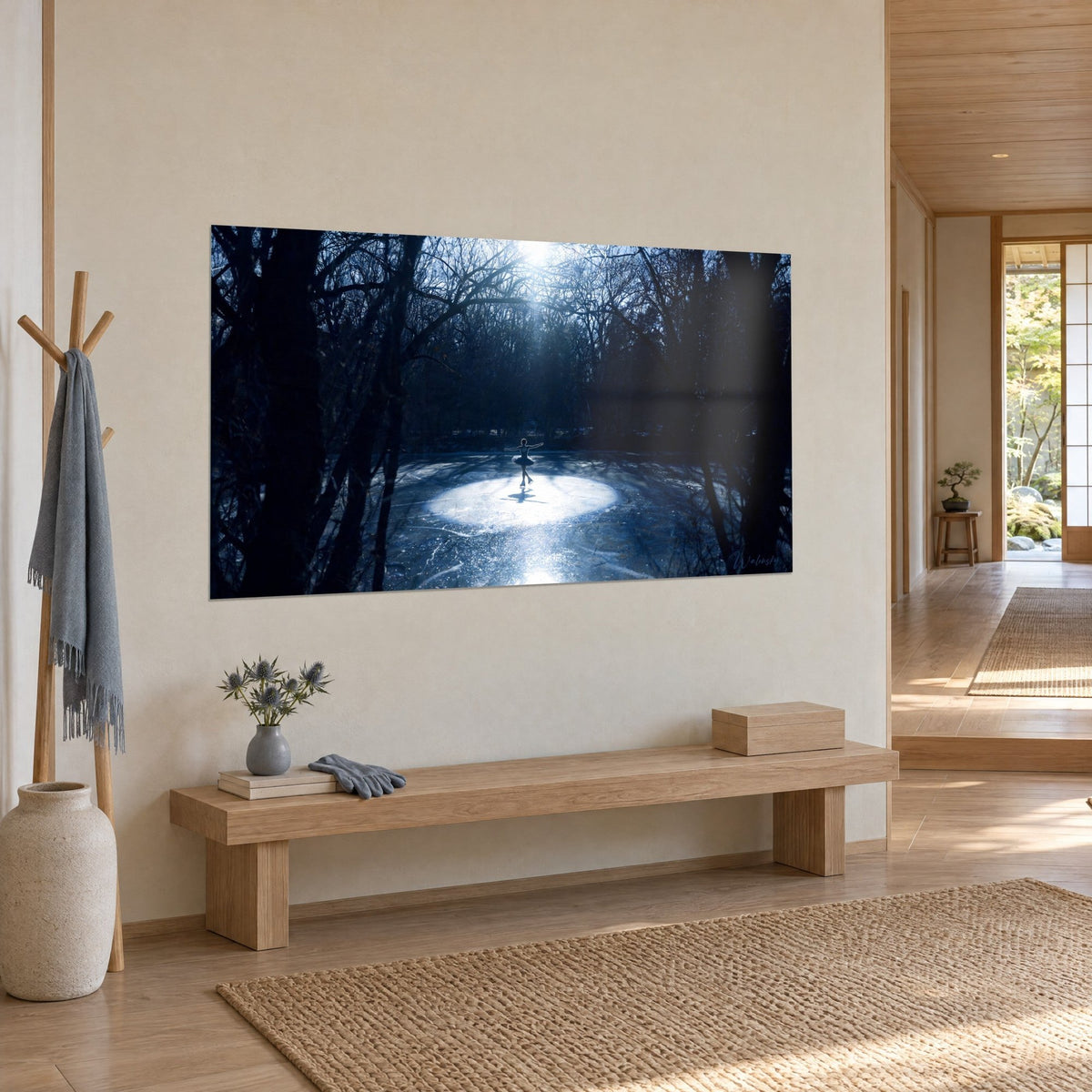 Wall art ice dancer, arms outstretched in a glowing circle, navy blue and pearly white, bare trees, Japandi living room