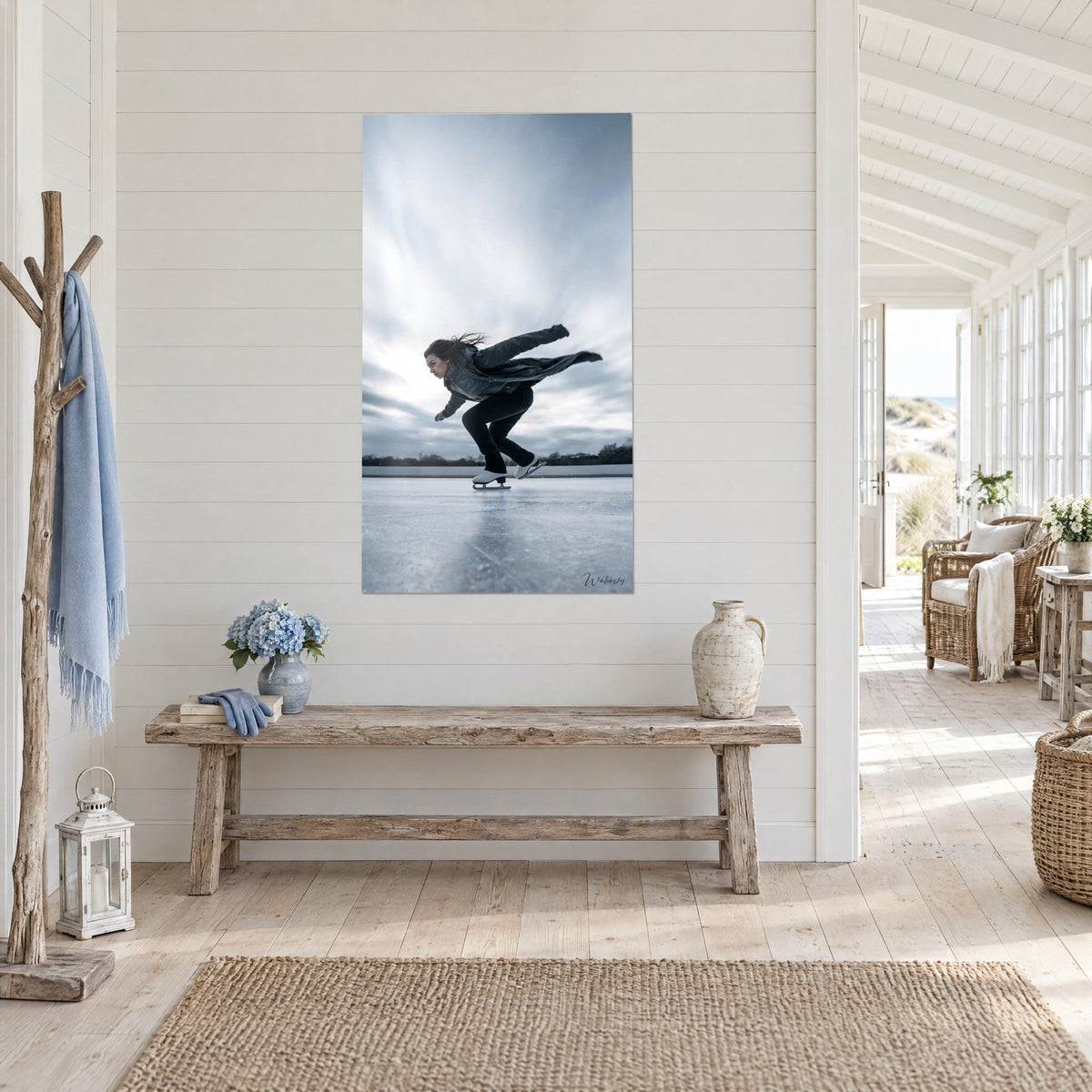 Wall art athlete gliding on the ice, grey jacket and white boots under a stormy sky, driftwood and rustic bench