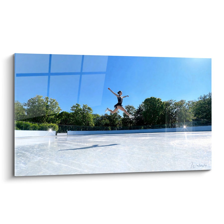 Tableau Patineuse suspendue en robe noire sur glace bleue - Envol suspendu - Edition Patinage artistique