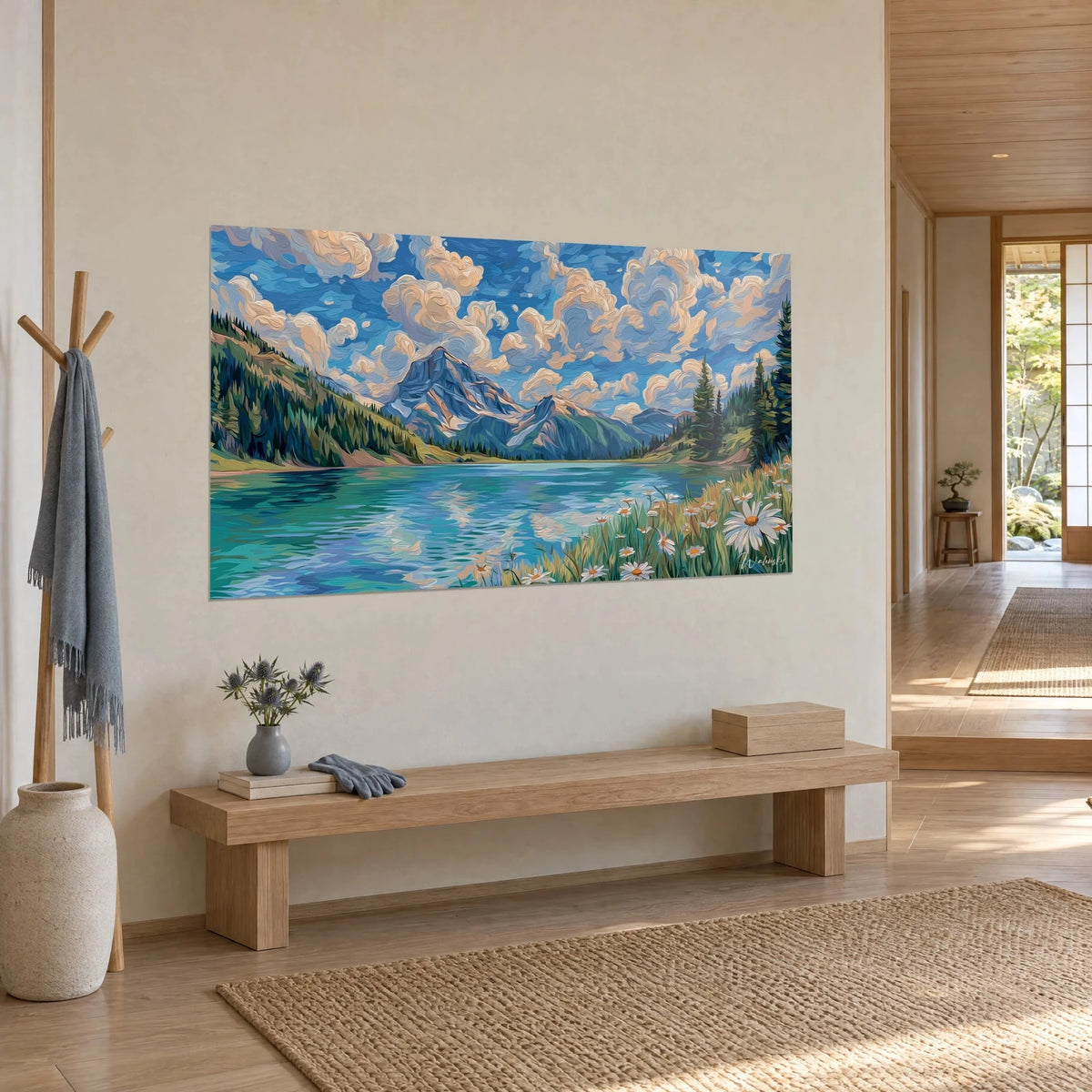 Wall art alpine mountain in thick brushstrokes, blue sky and ochre clouds, grassy flower-dotted shore, beige wall of a japandi entryway