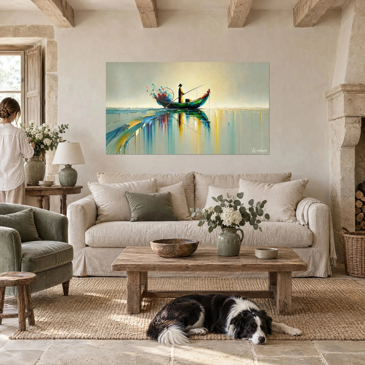 Tableau pêcheur au chapeau conique sur barque verte, reflets turquoise et jaune, au-dessus d'un canapé dans un salon lumineux