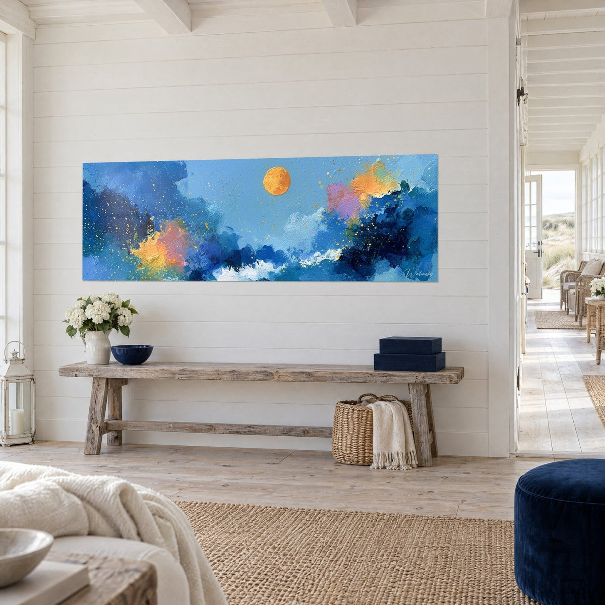 Wall art saffron celestial body above white foam crests and midnight blue, pink and yellow touches, on a wall of white wooden slats by the sea