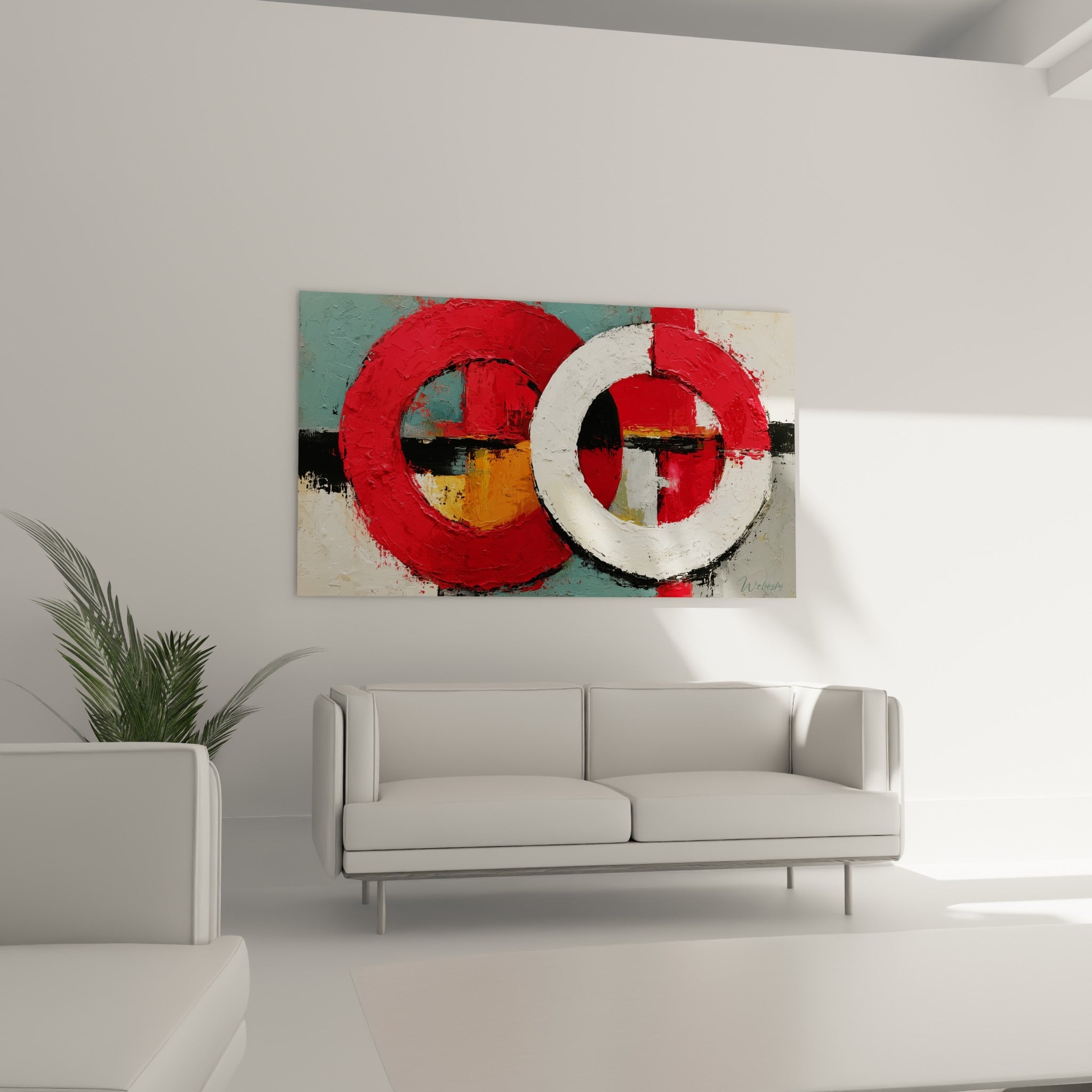 Composition rouge, blanc et ocre au-dessus d'un canapé dans un salon lumineux, formes circulaires marquées